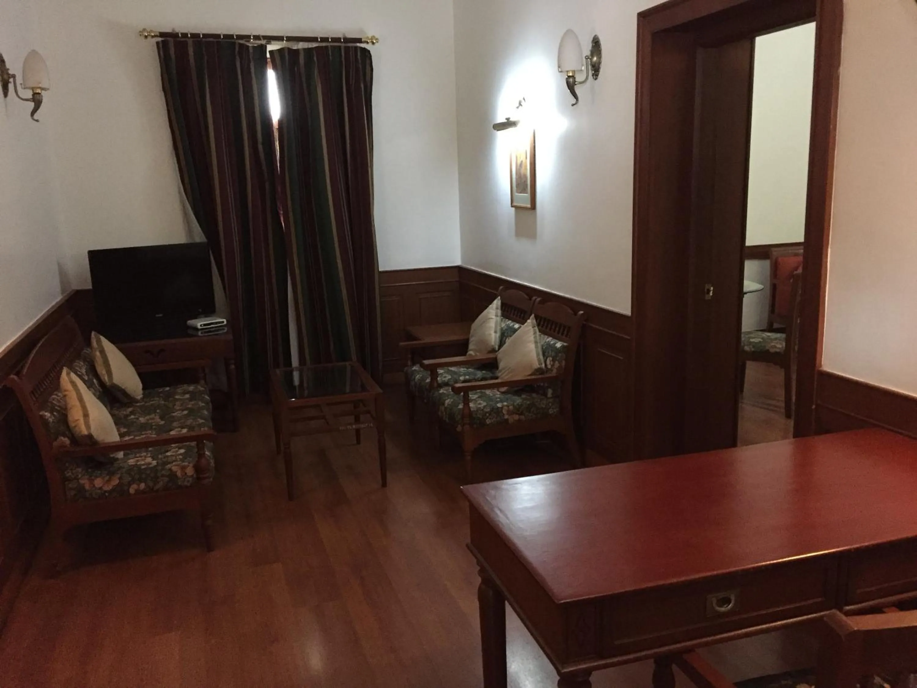 Living room in KTDC Mascot Hotel - A Heritage Living Experience
