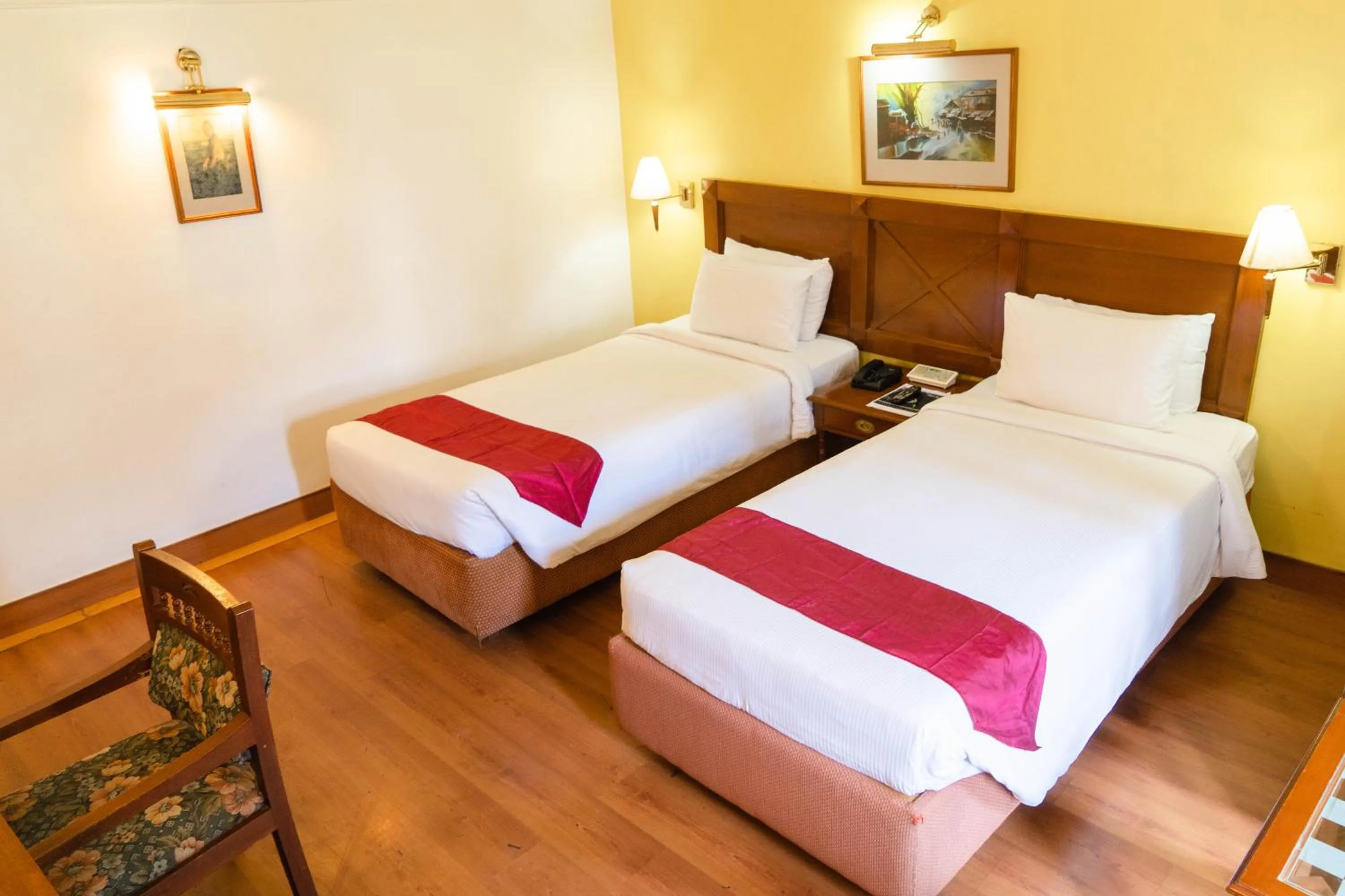 Bed in KTDC Mascot Hotel - A Heritage Living Experience
