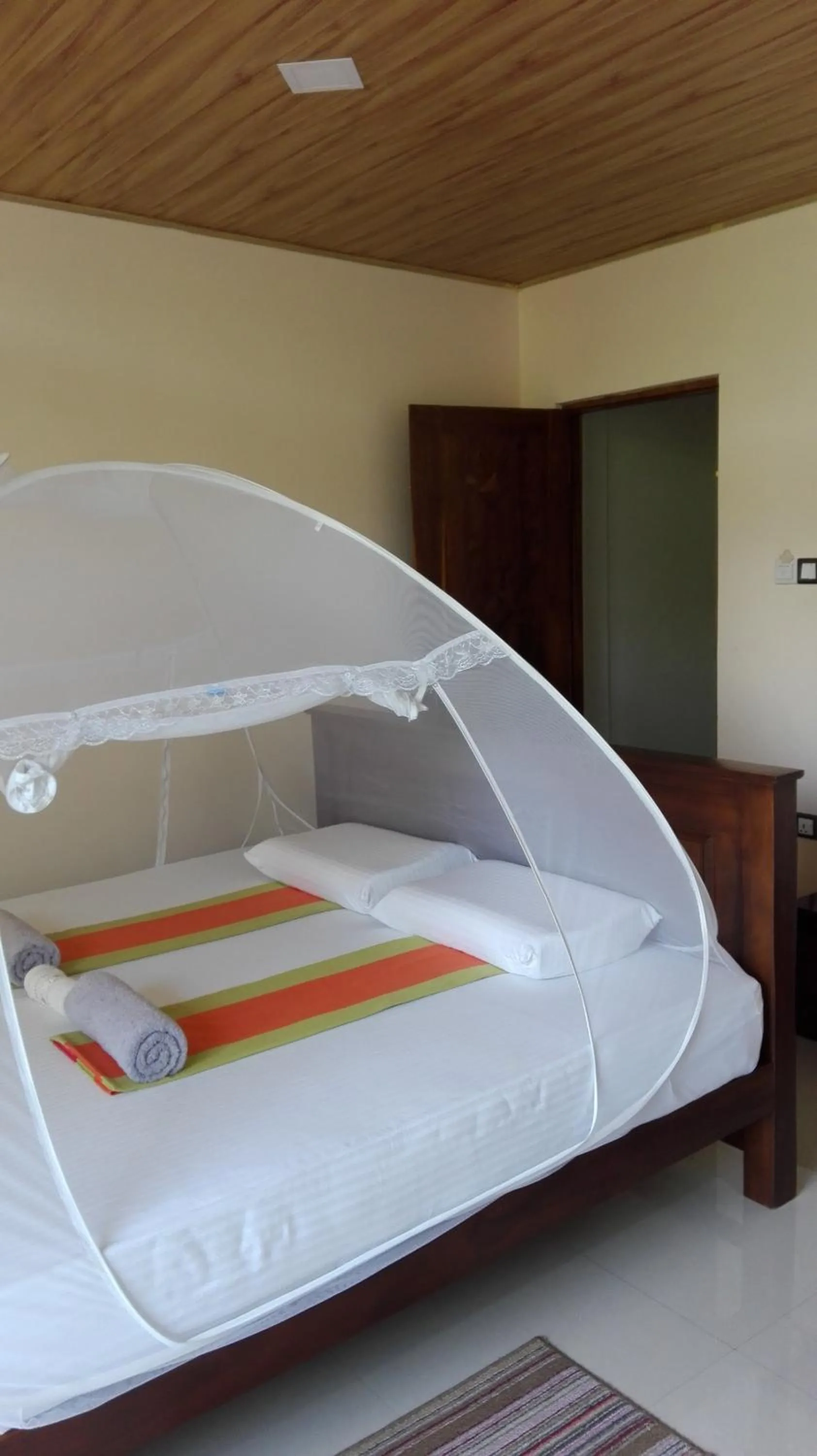 Bed in Rajarata Reach Resort