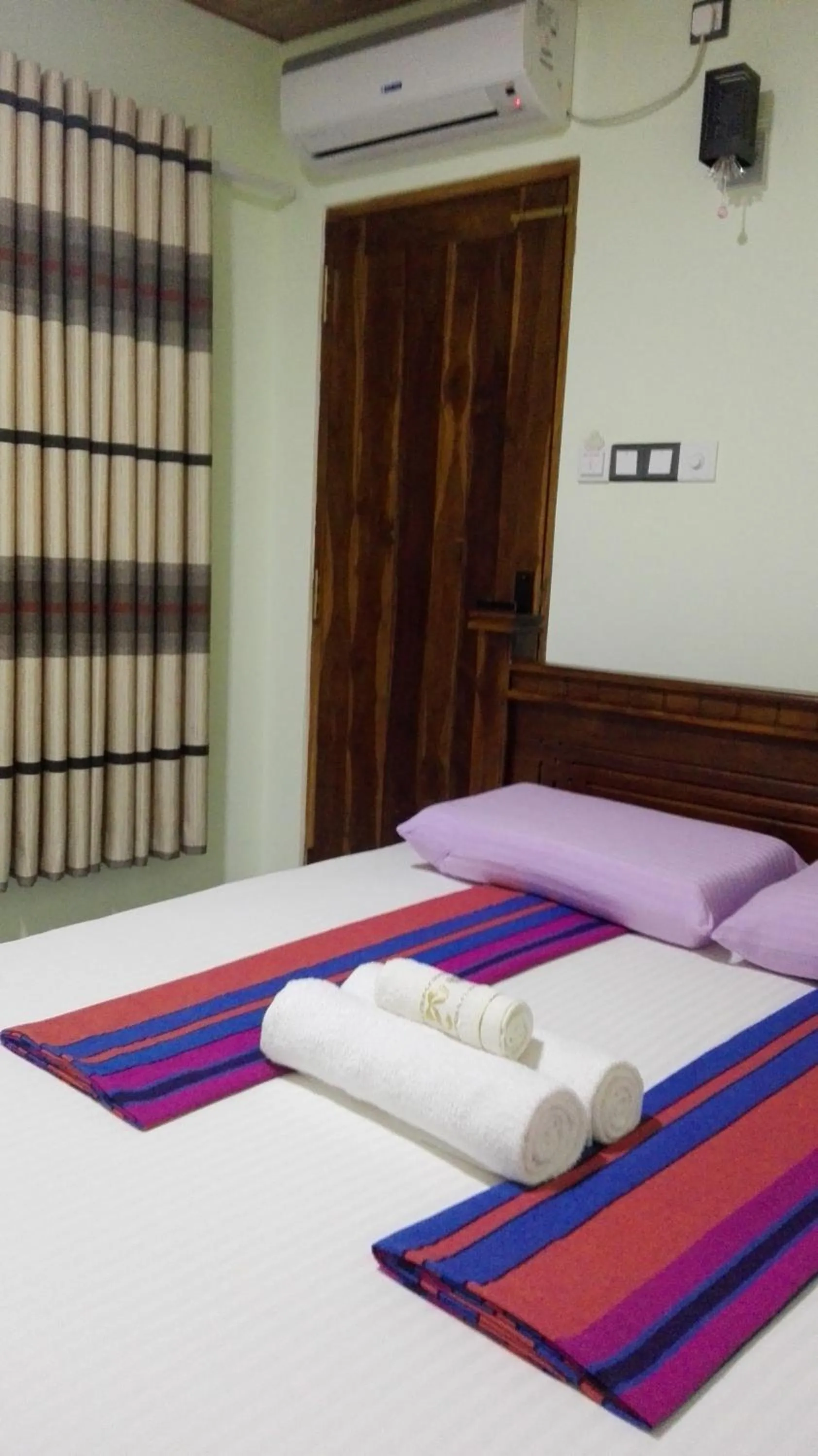 Bed in Rajarata Reach Resort
