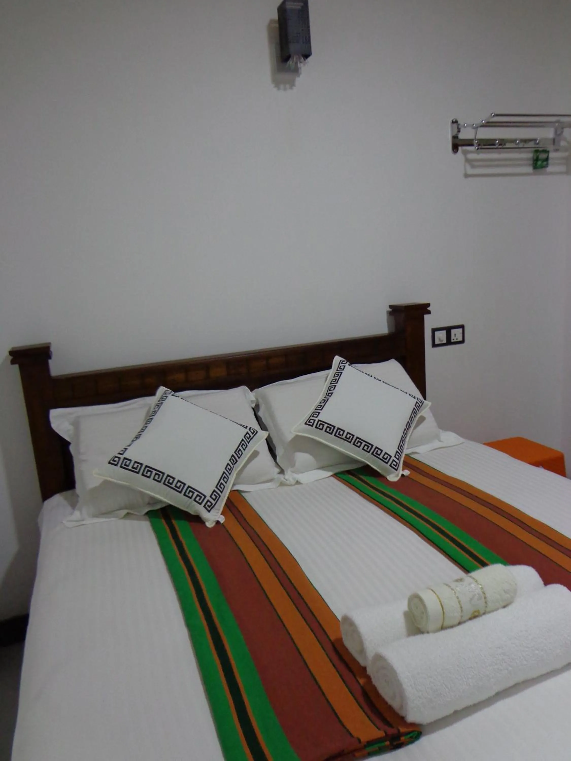 Bed in Rajarata Reach Resort