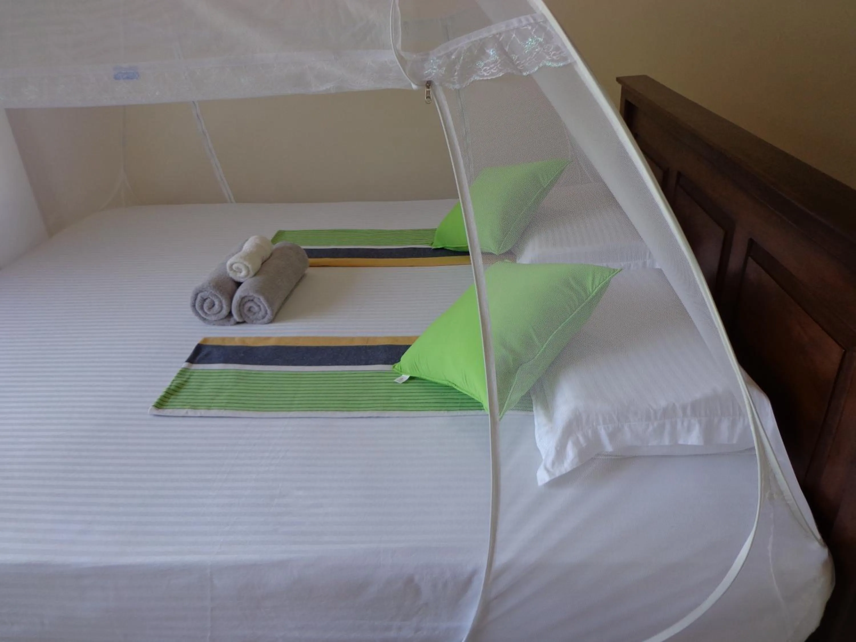 Bed in Rajarata Reach Resort