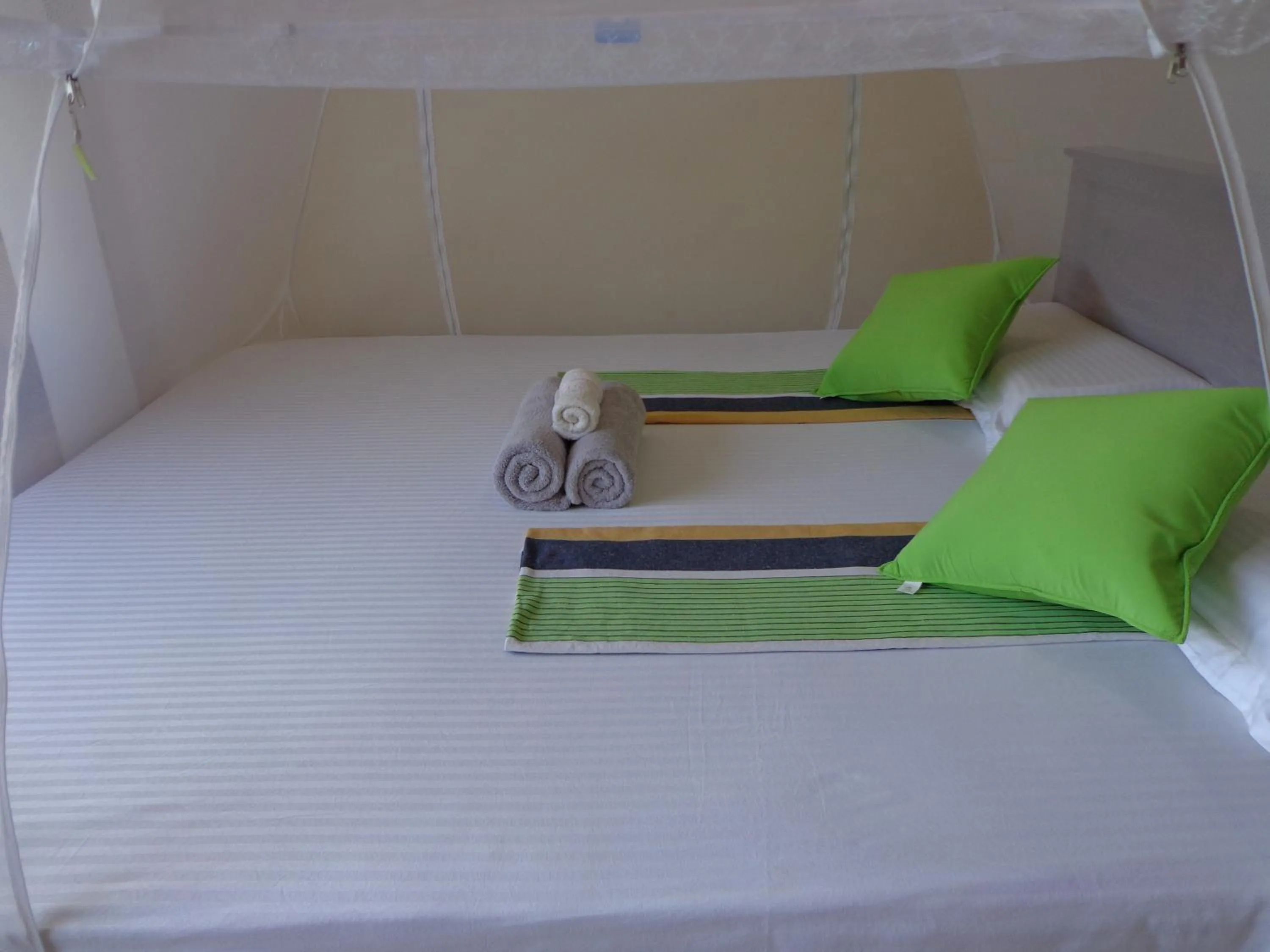 Bed in Rajarata Reach Resort