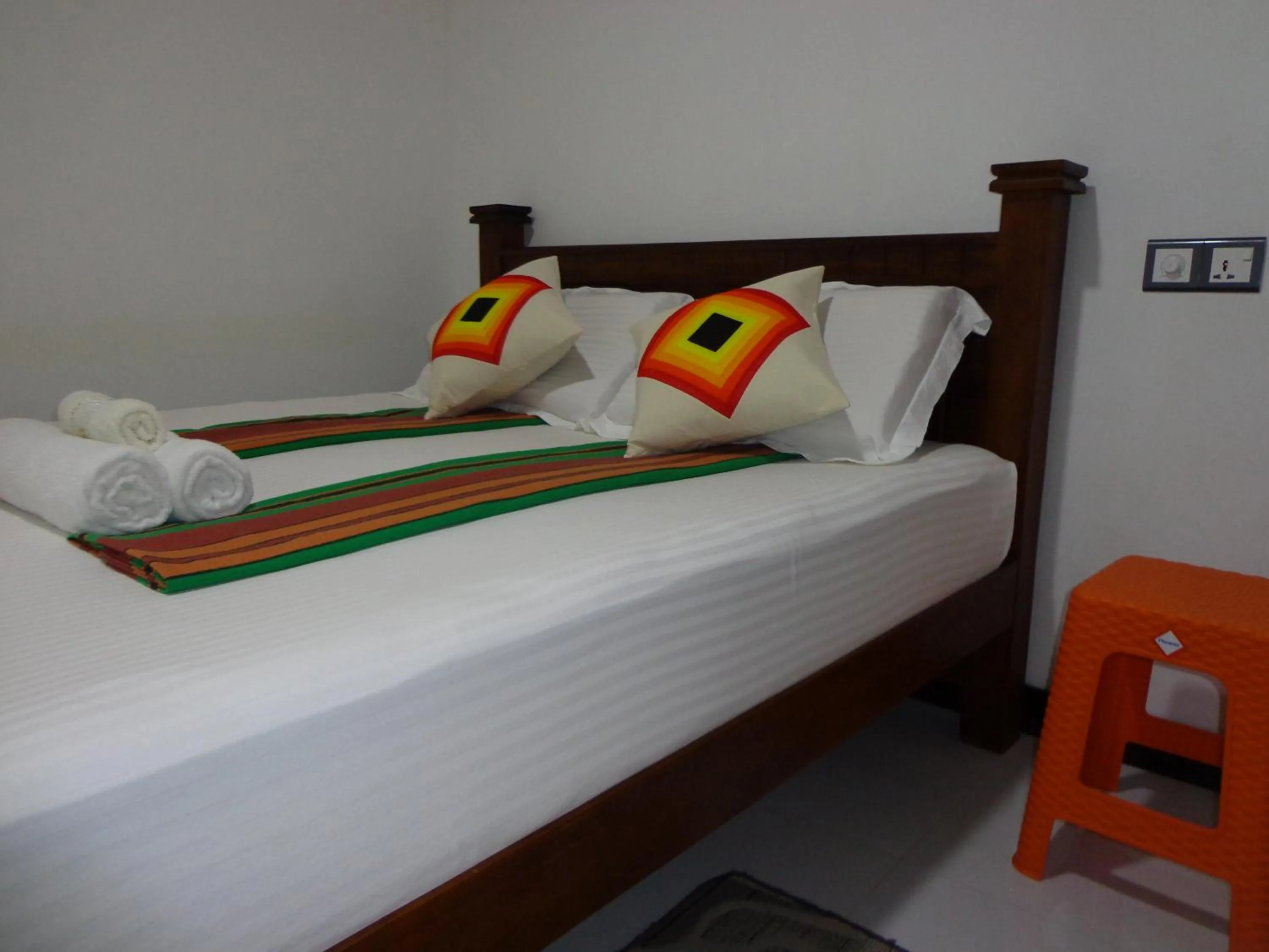 Bed in Rajarata Reach Resort