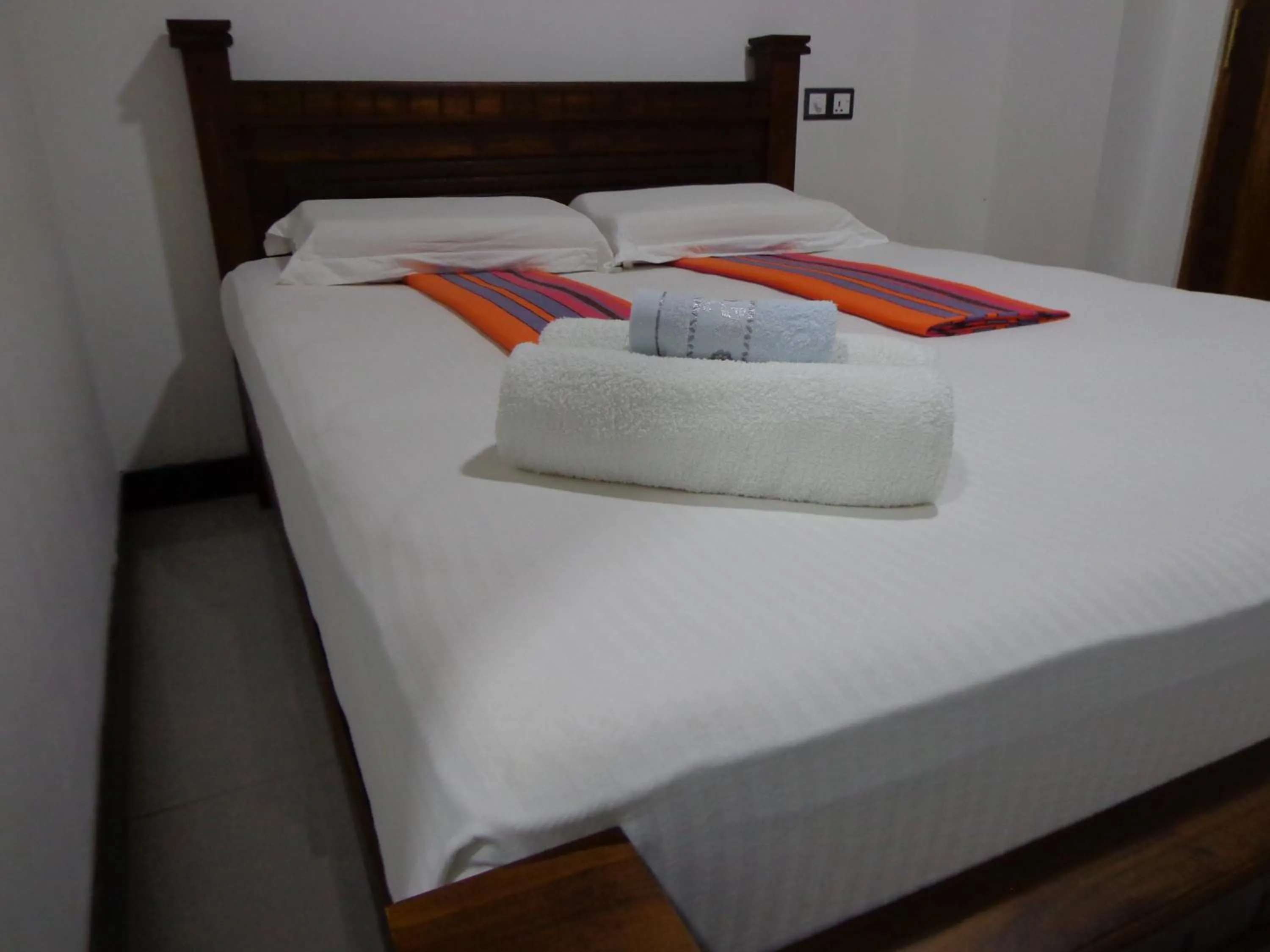 Bed in Rajarata Reach Resort