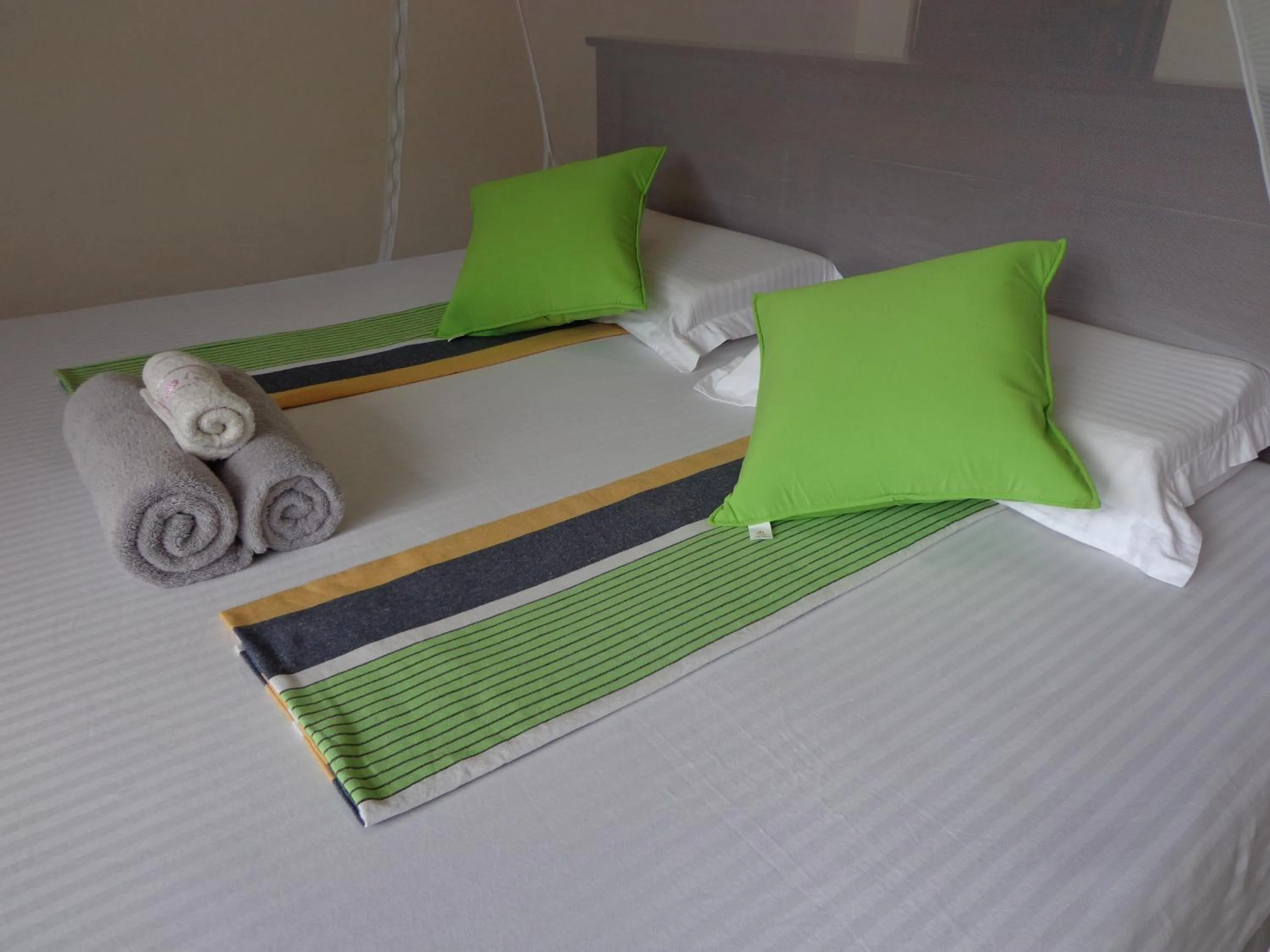 Bed in Rajarata Reach Resort