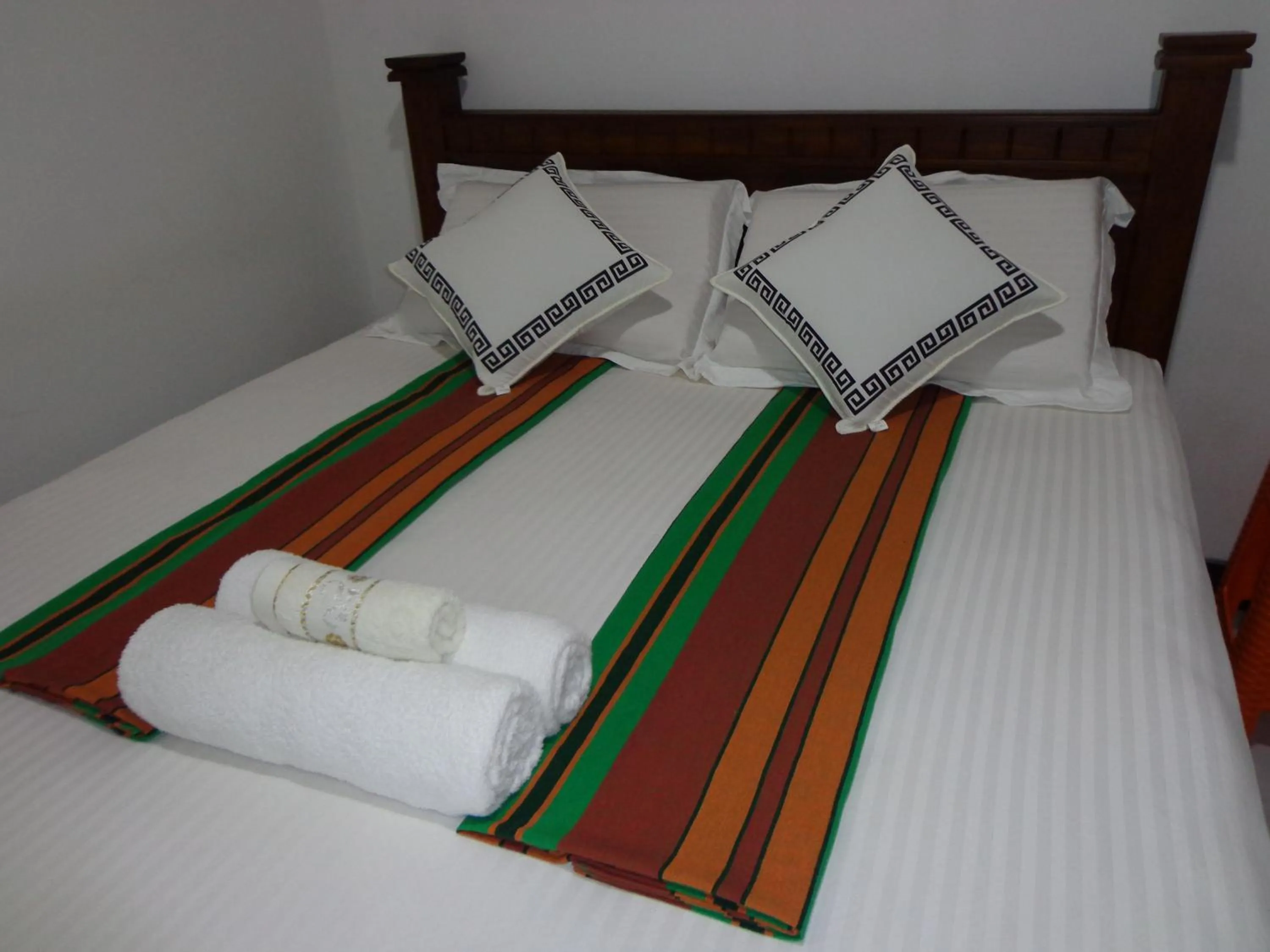 Bed in Rajarata Reach Resort