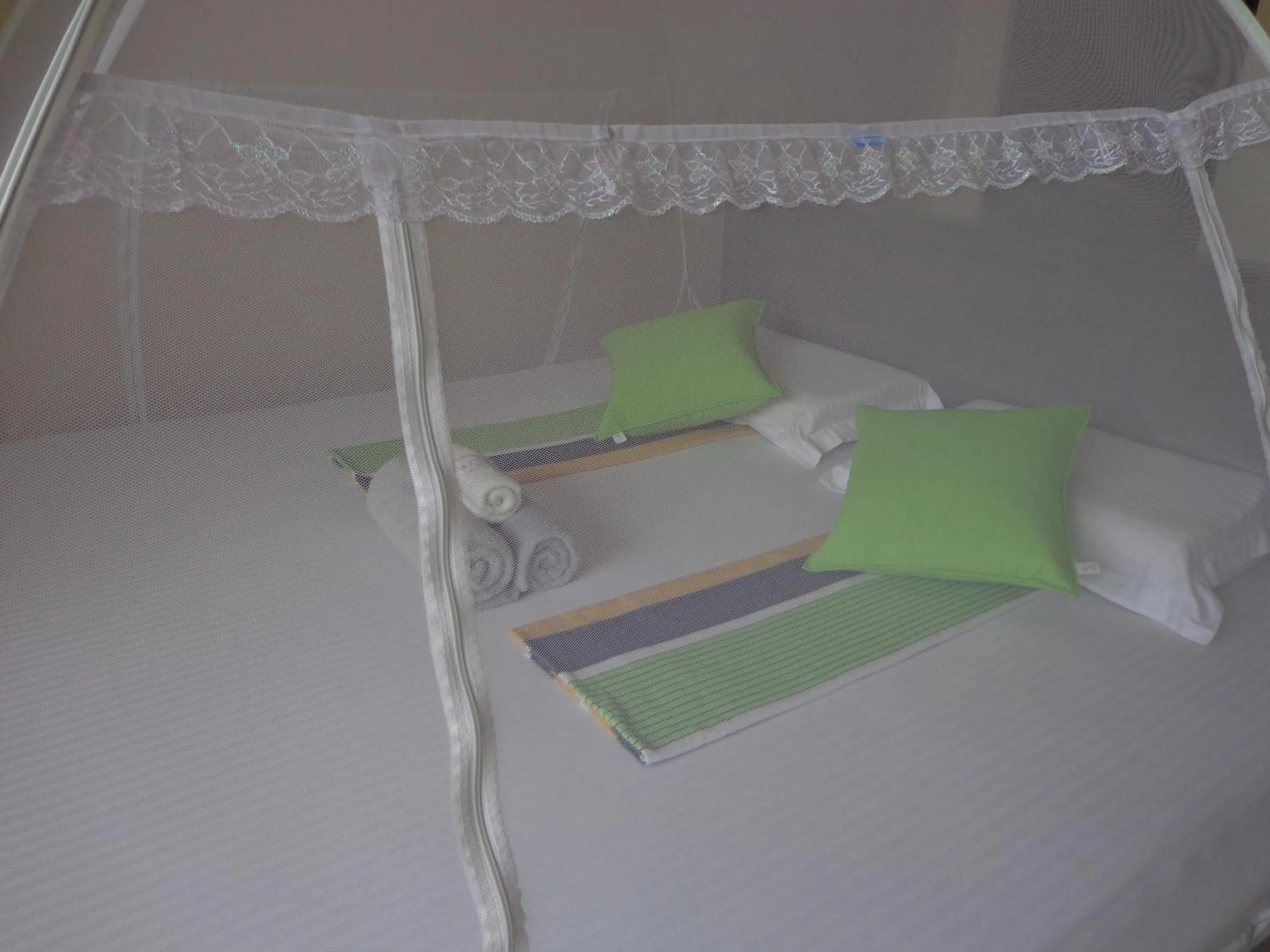 Bed in Rajarata Reach Resort