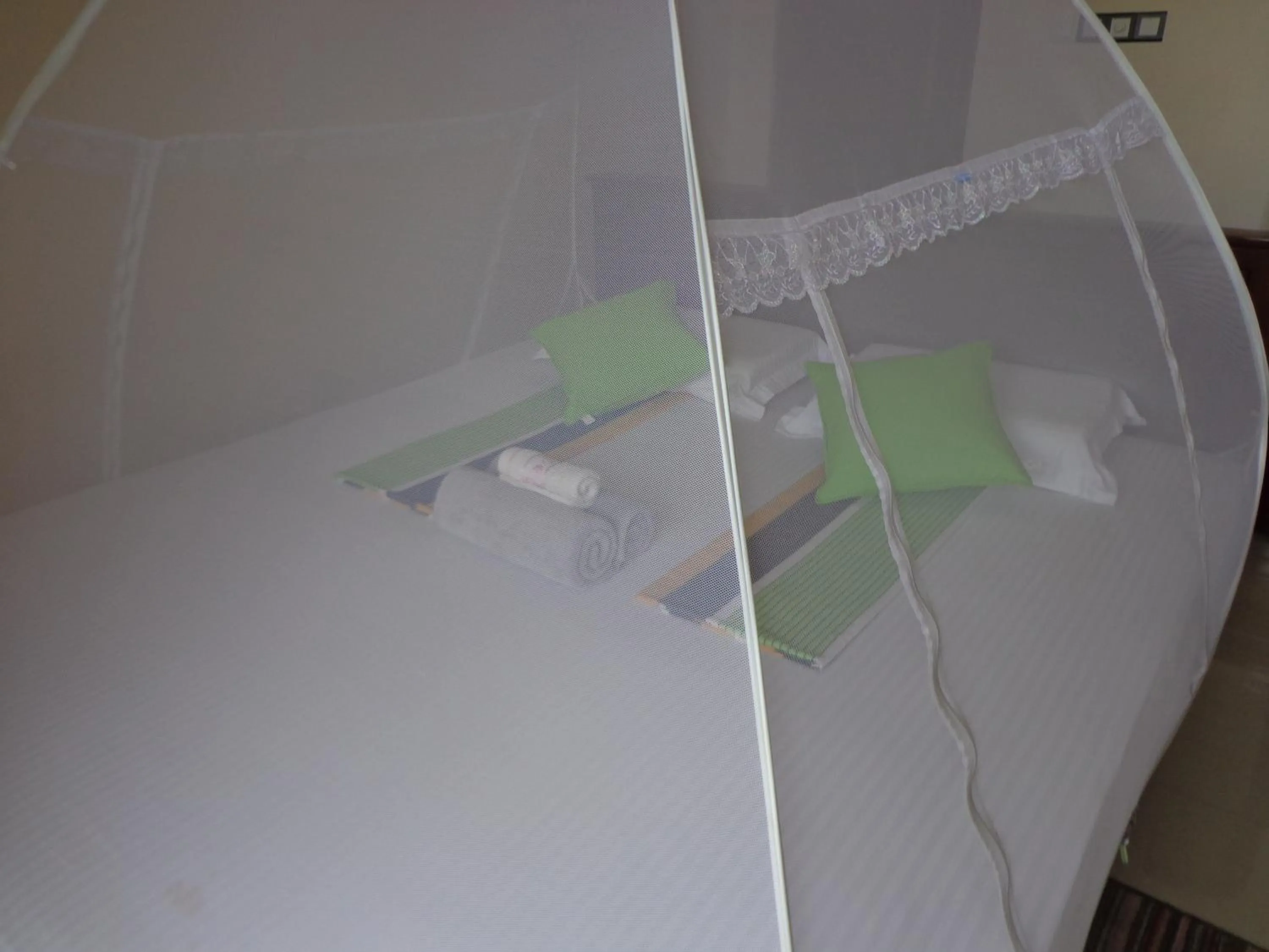 Bed in Rajarata Reach Resort