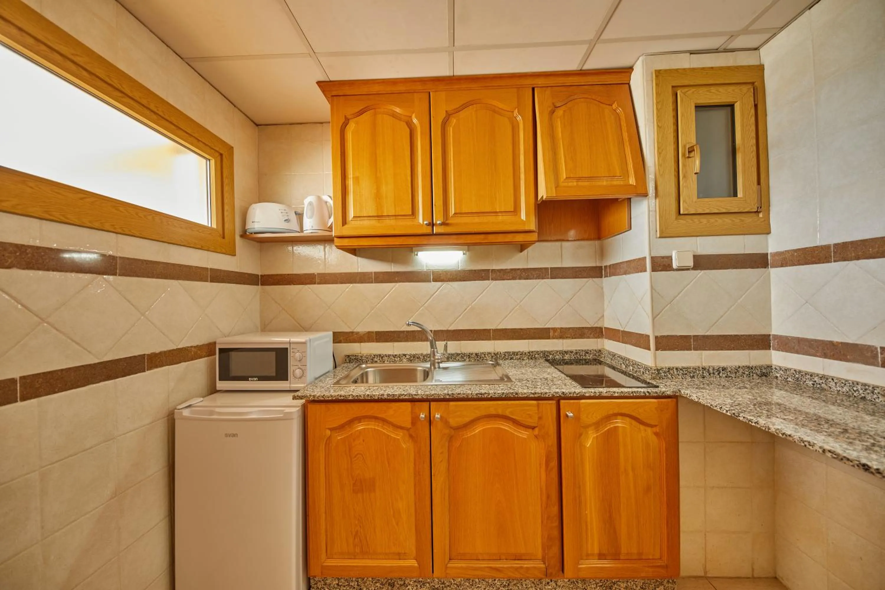 Kitchen or kitchenette in Apartamentos Ben-Hur