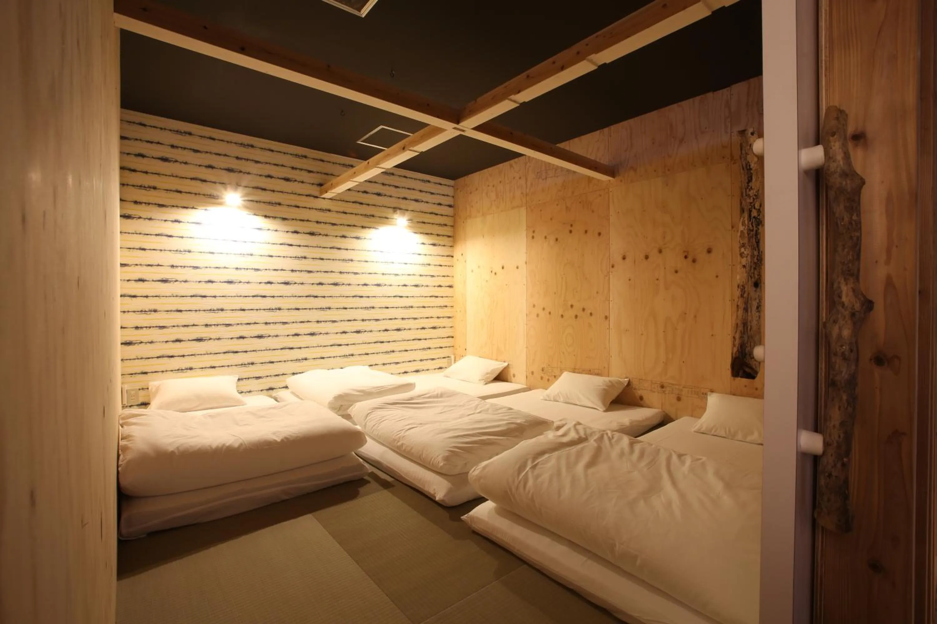 Photo of the whole room, Bed in Guest House Chura Cucule Ishigakijima