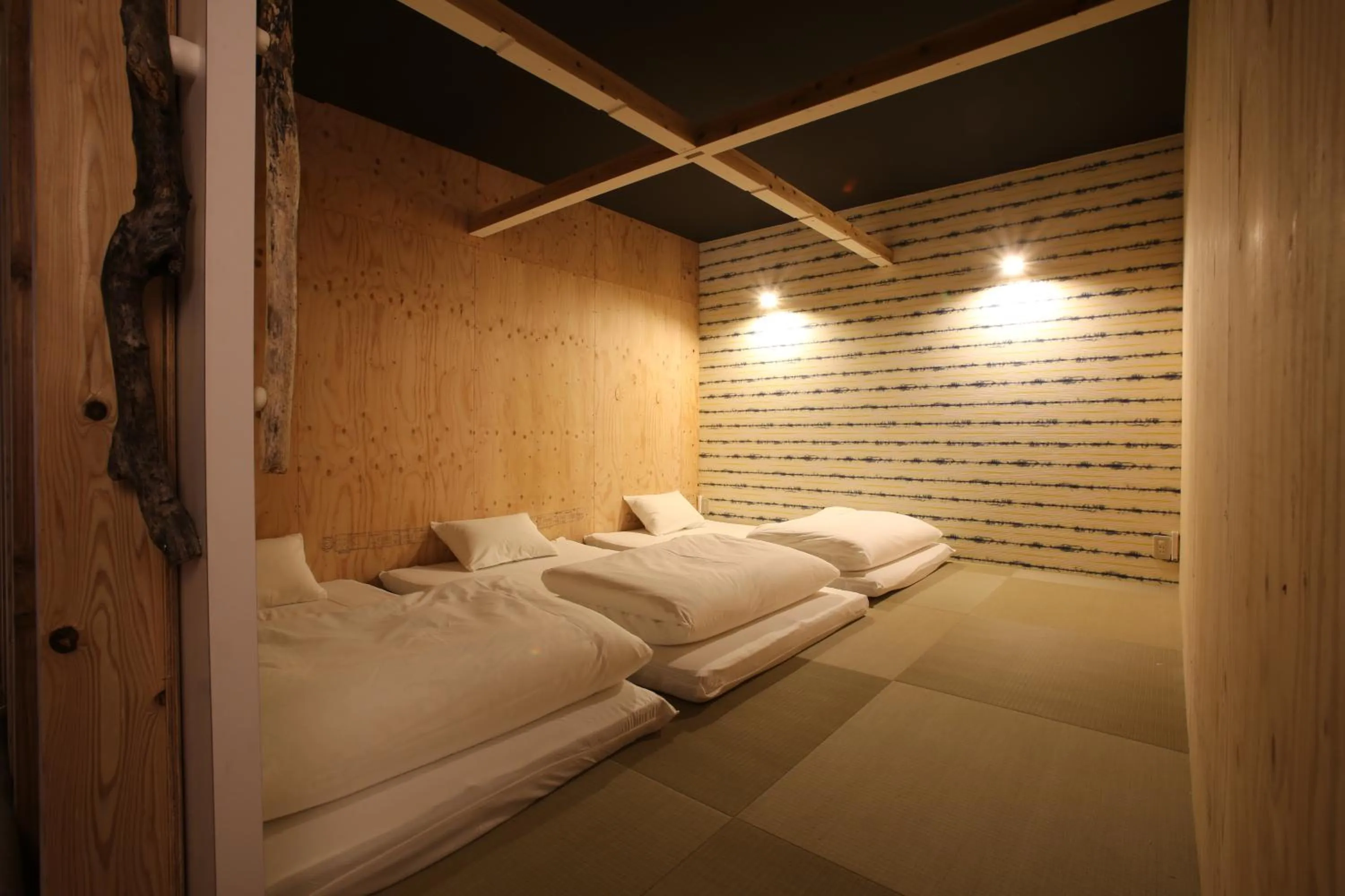 Photo of the whole room, Bed in Guest House Chura Cucule Ishigakijima