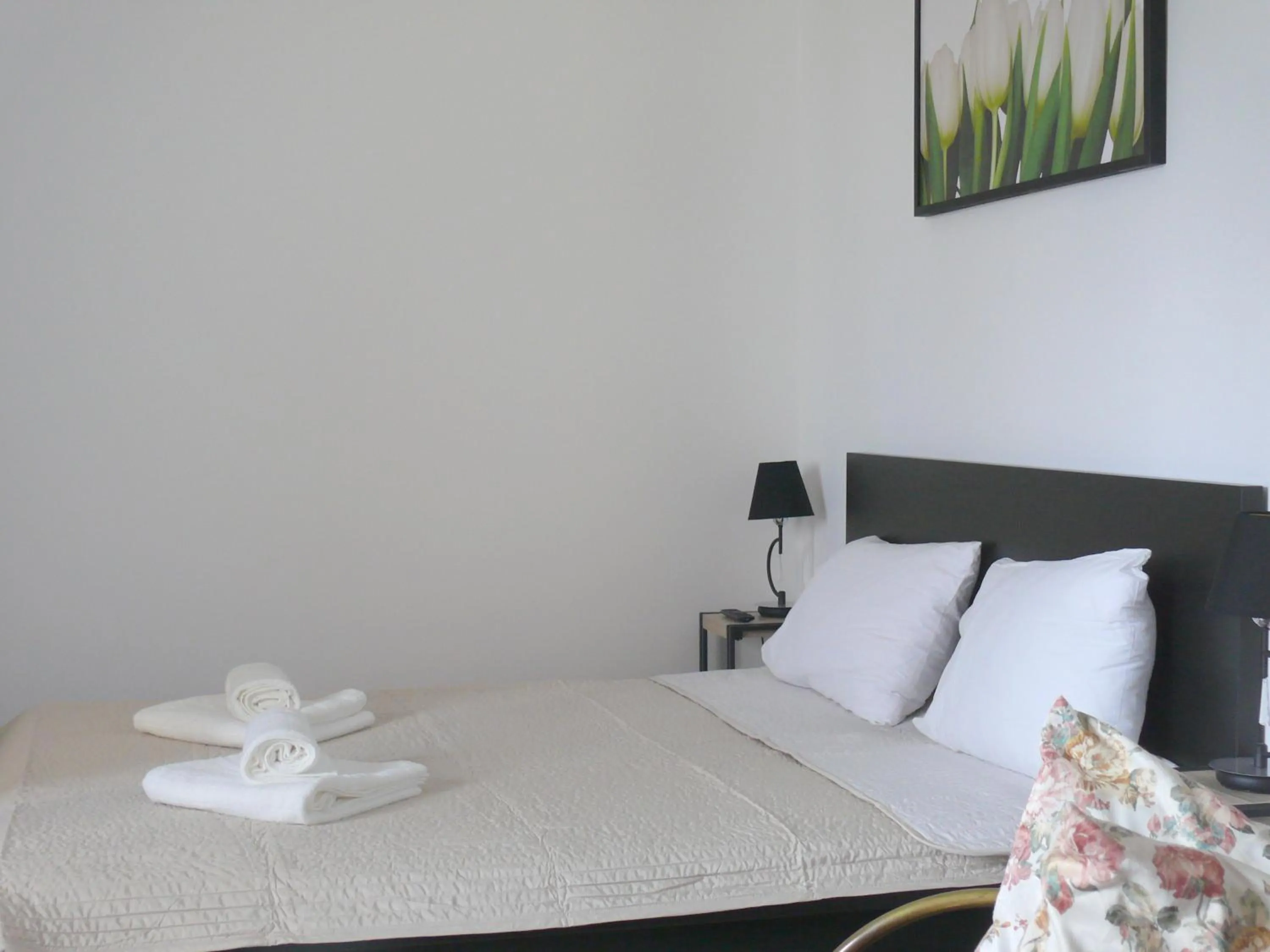 Bed in Diamond Astoria Apartments