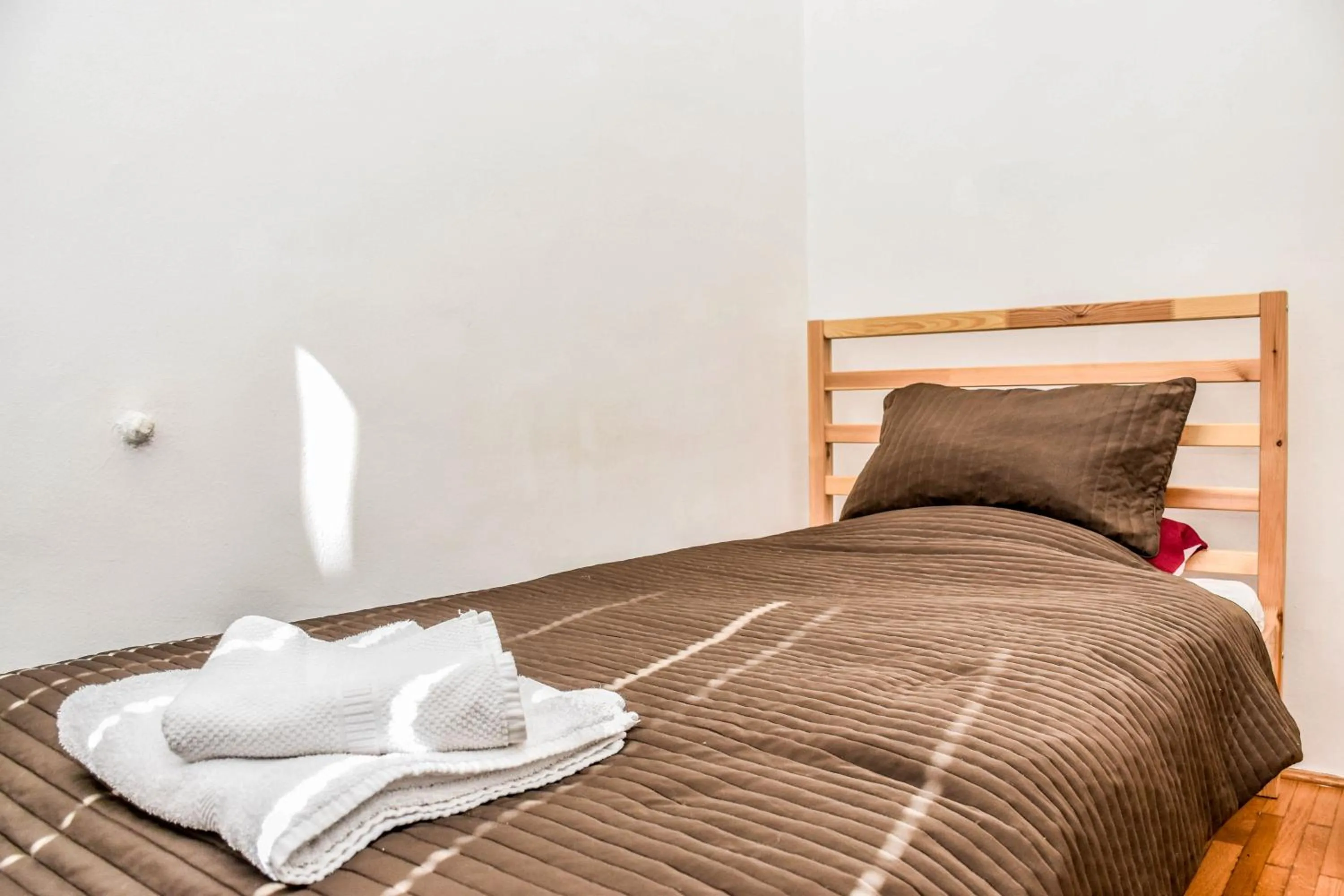 Bed in Diamond Astoria Apartments