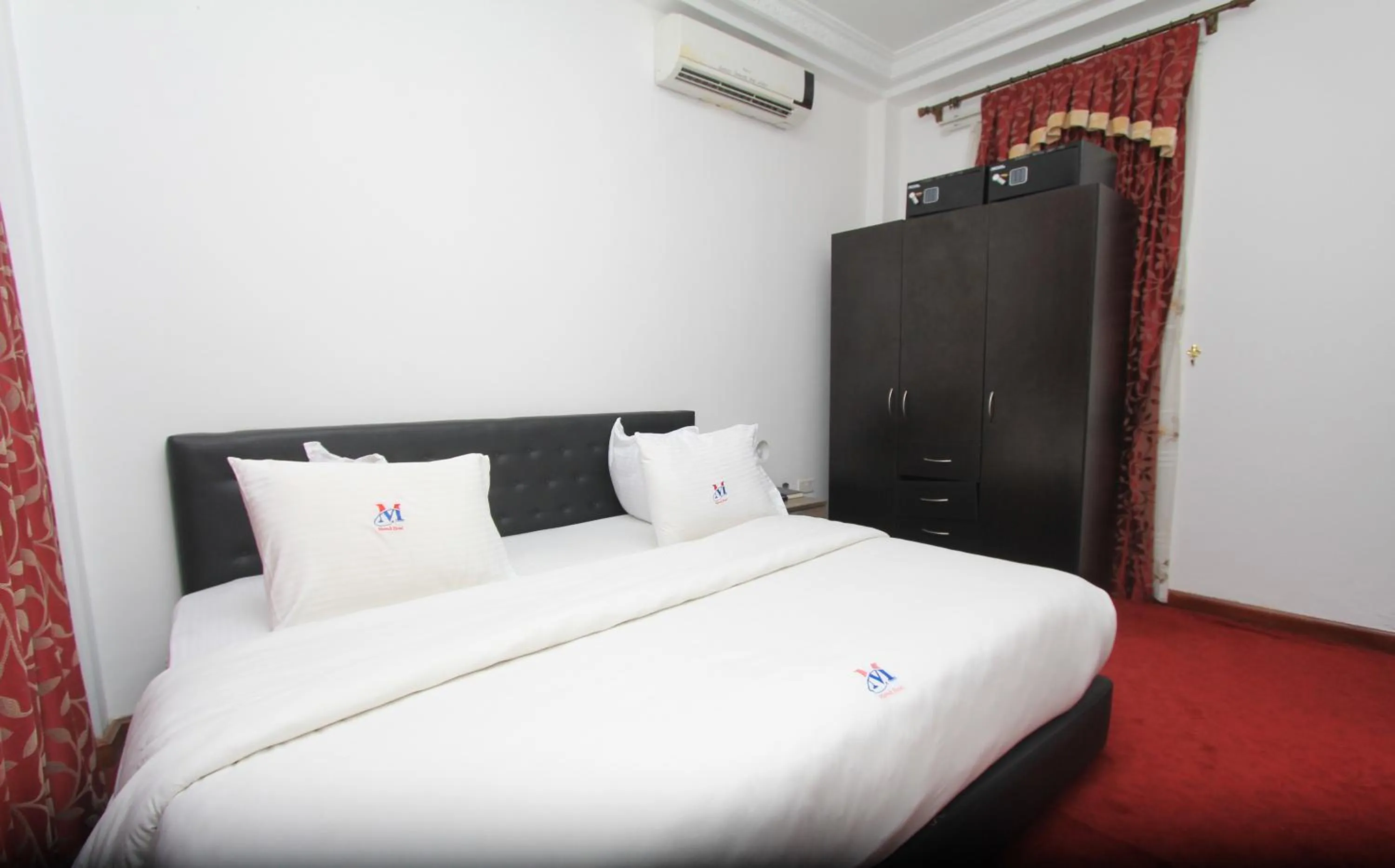 Bed in Mawuli Hotel
