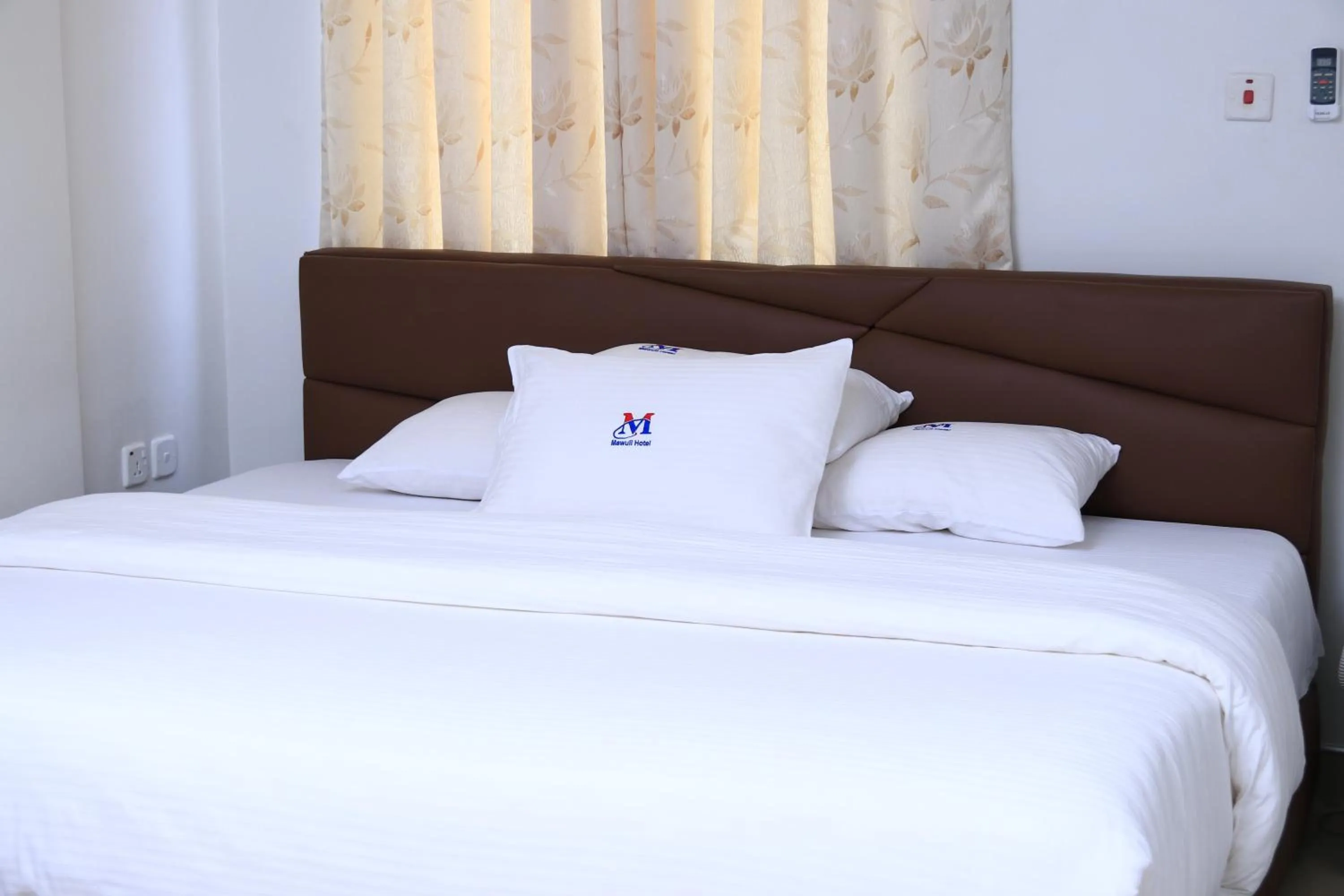 Bed in Mawuli Hotel