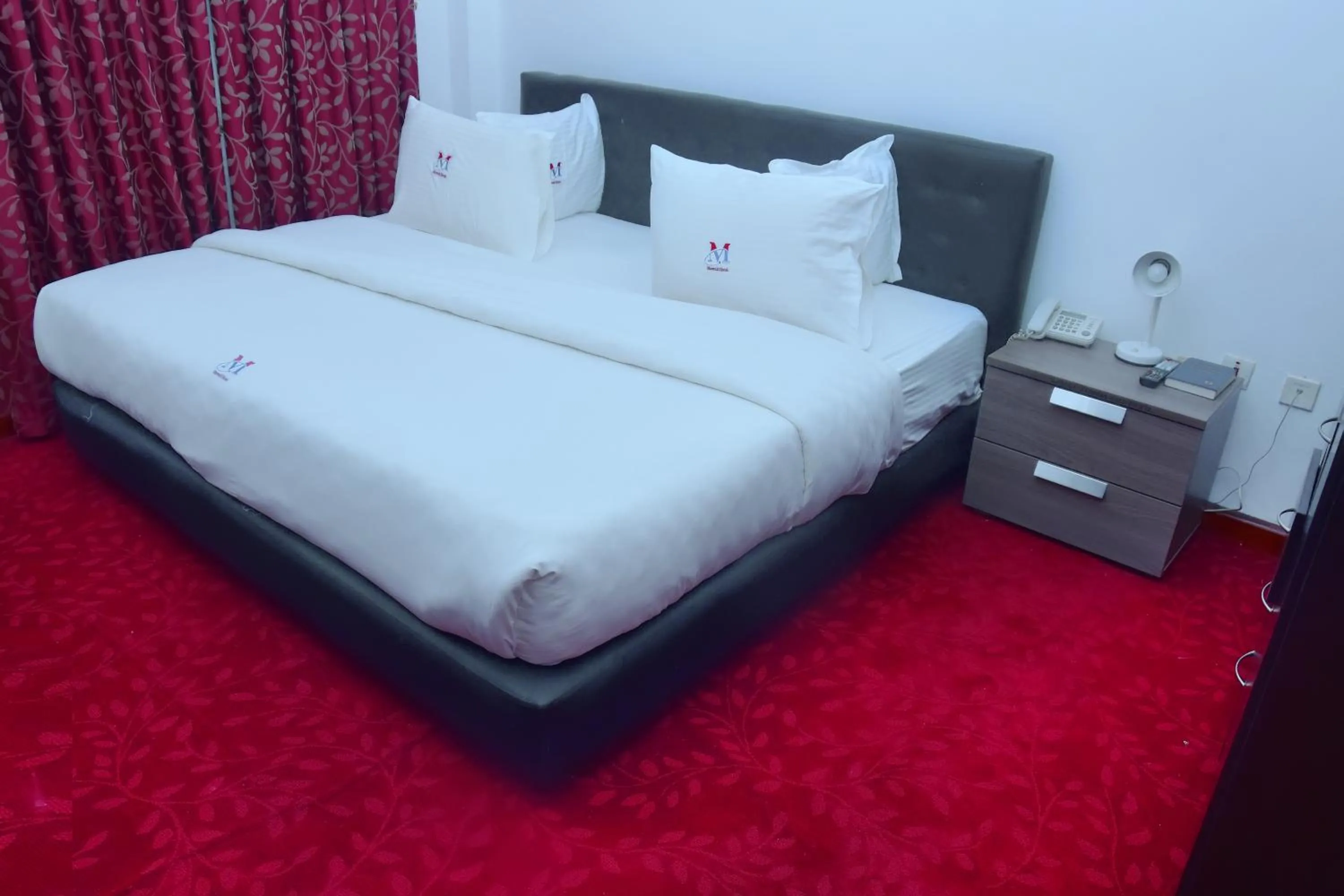 Bed in Mawuli Hotel