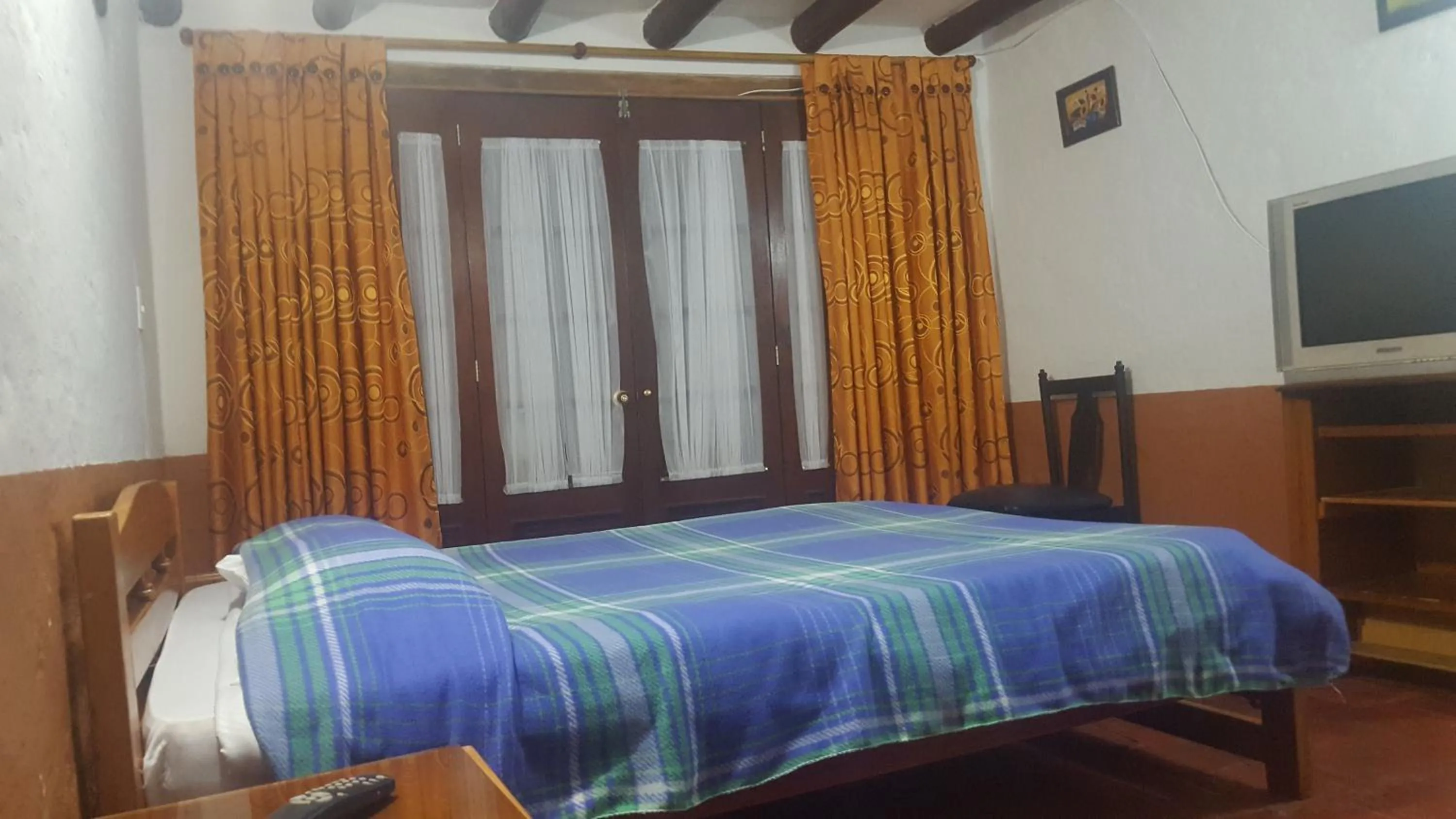 Photo of the whole room, Bed in La Posada Pyg