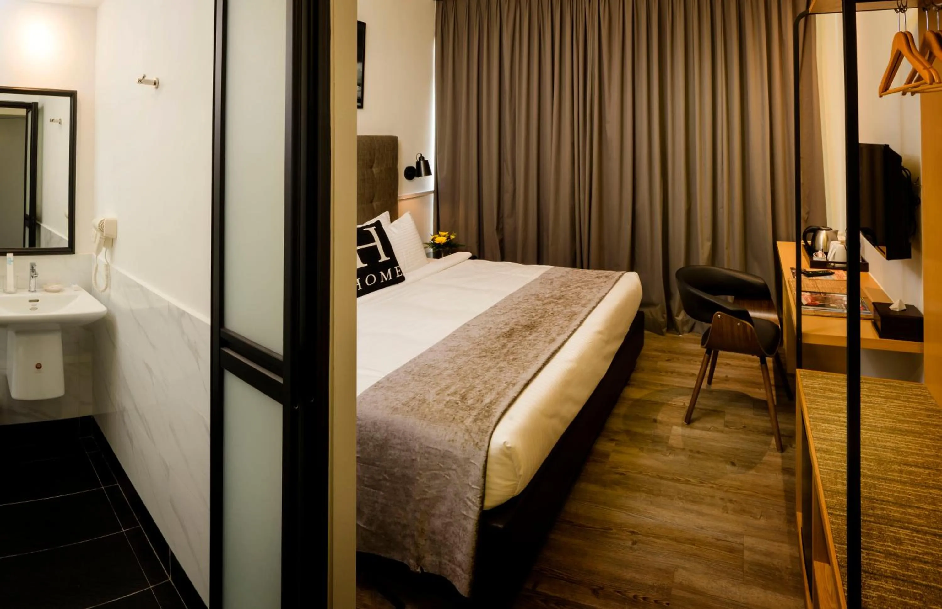 Photo of the whole room, Bed in H Boutique Hotel, Kota Damansara