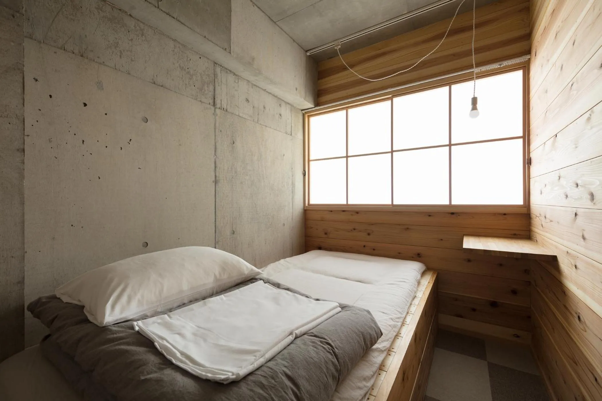 Bed in Sai no Tsuno Guest House