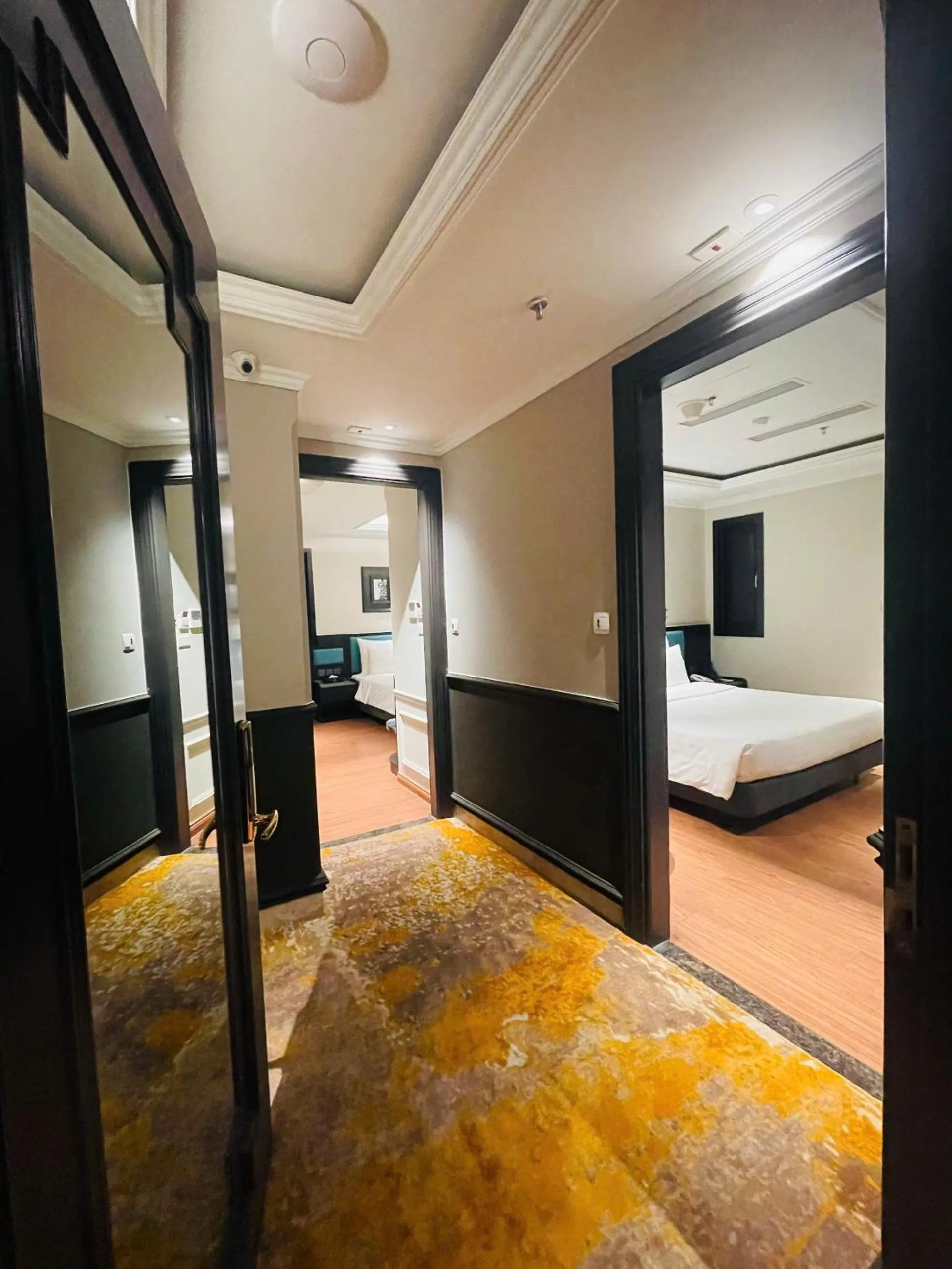 Photo of the whole room, Bed in Champton Hanoi Hotel