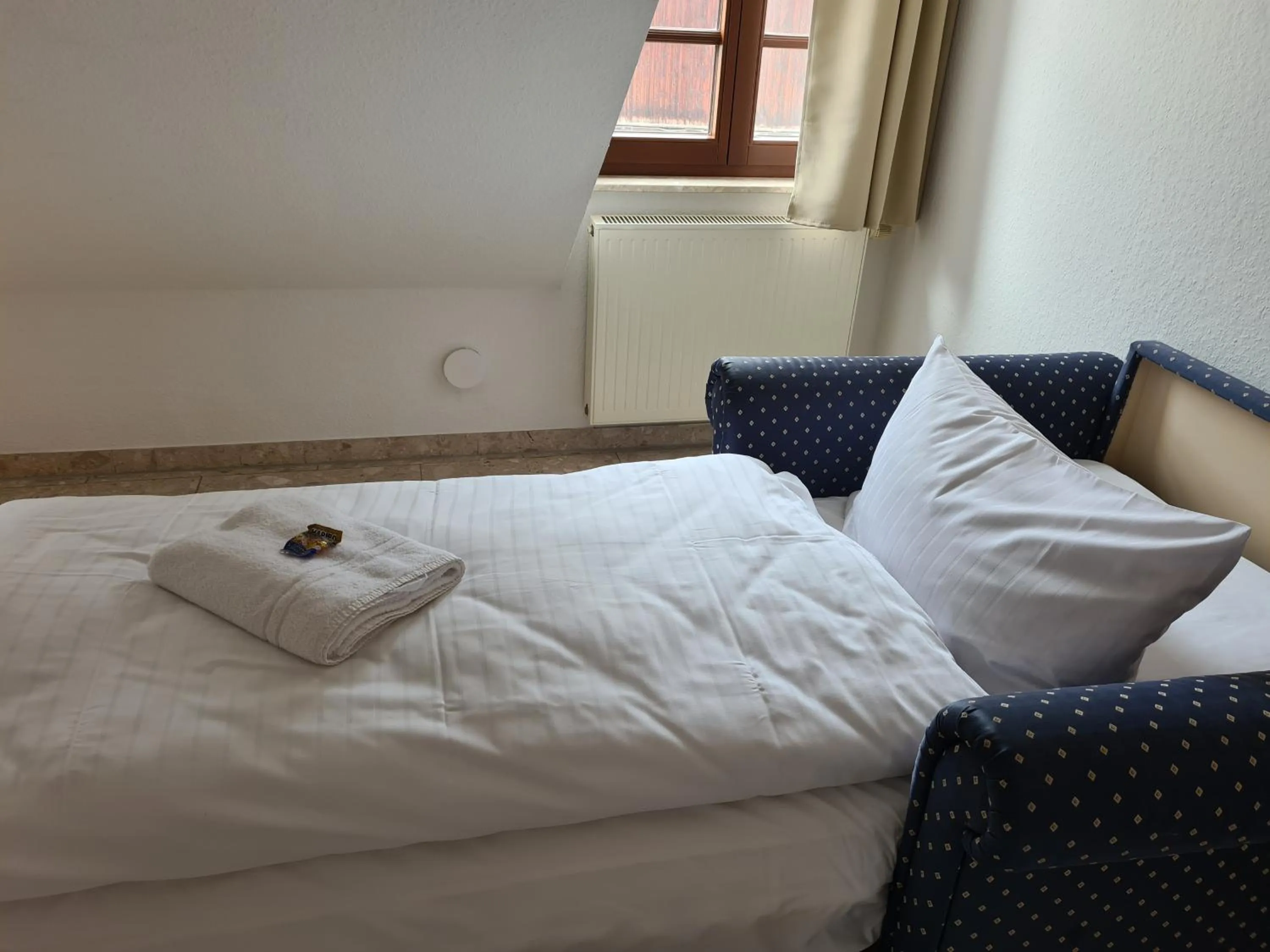 Photo of the whole room, Bed in Hotel Brauhaus Wittenberg