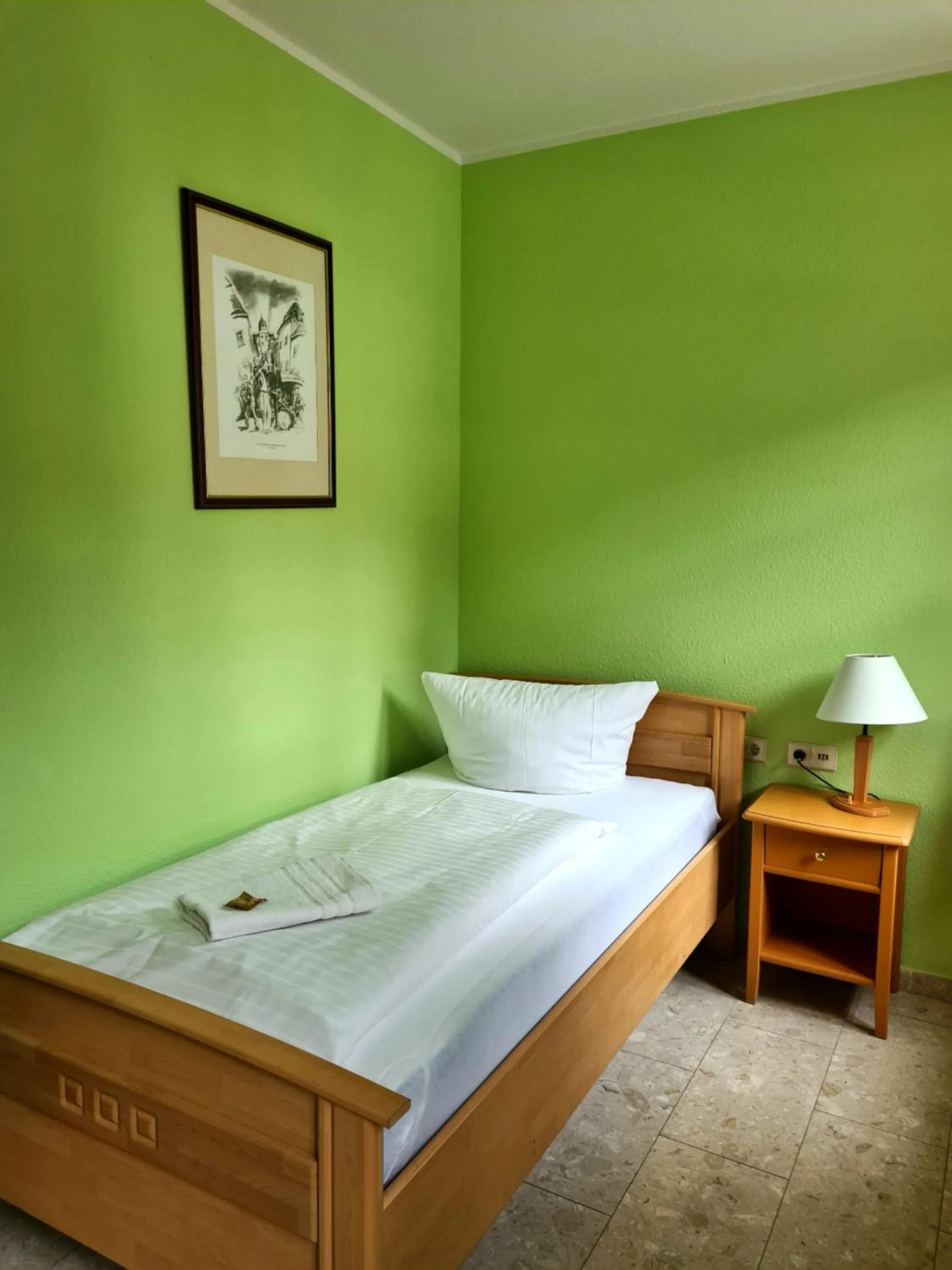 Photo of the whole room, Bed in Hotel Brauhaus Wittenberg