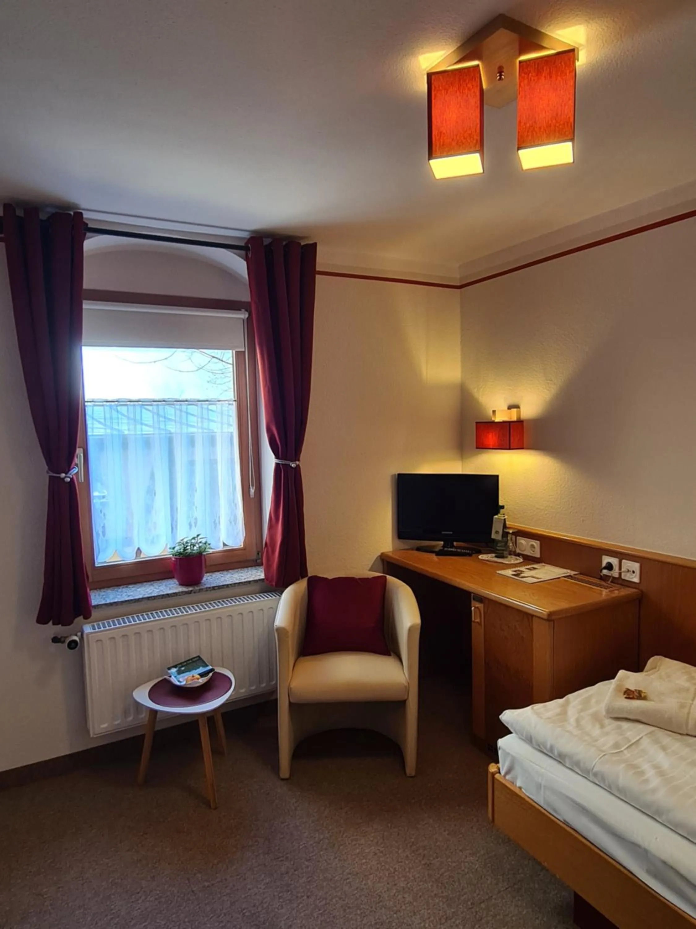 Photo of the whole room, Bed in Hotel Brauhaus Wittenberg