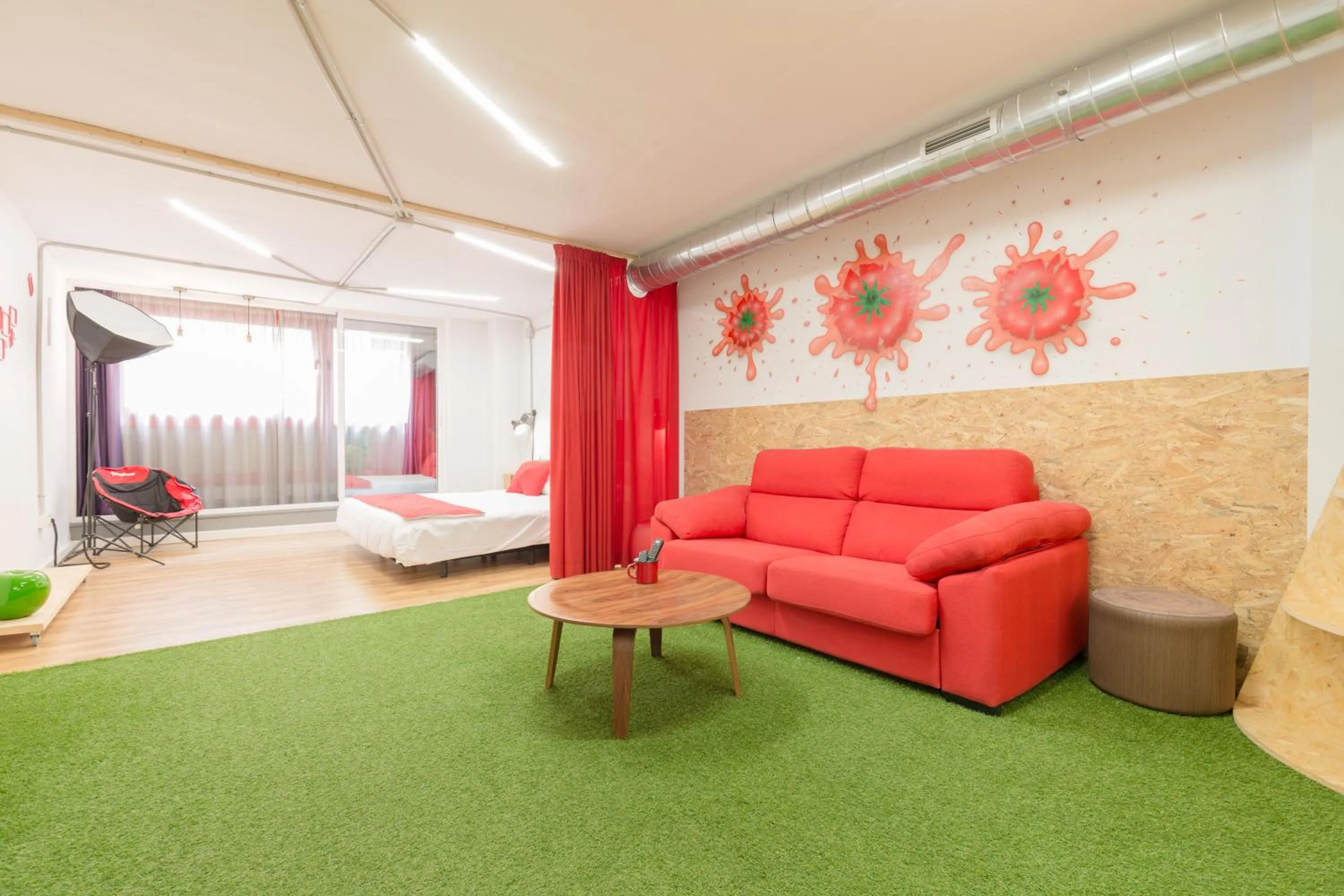 Bed in Tomate Rooms