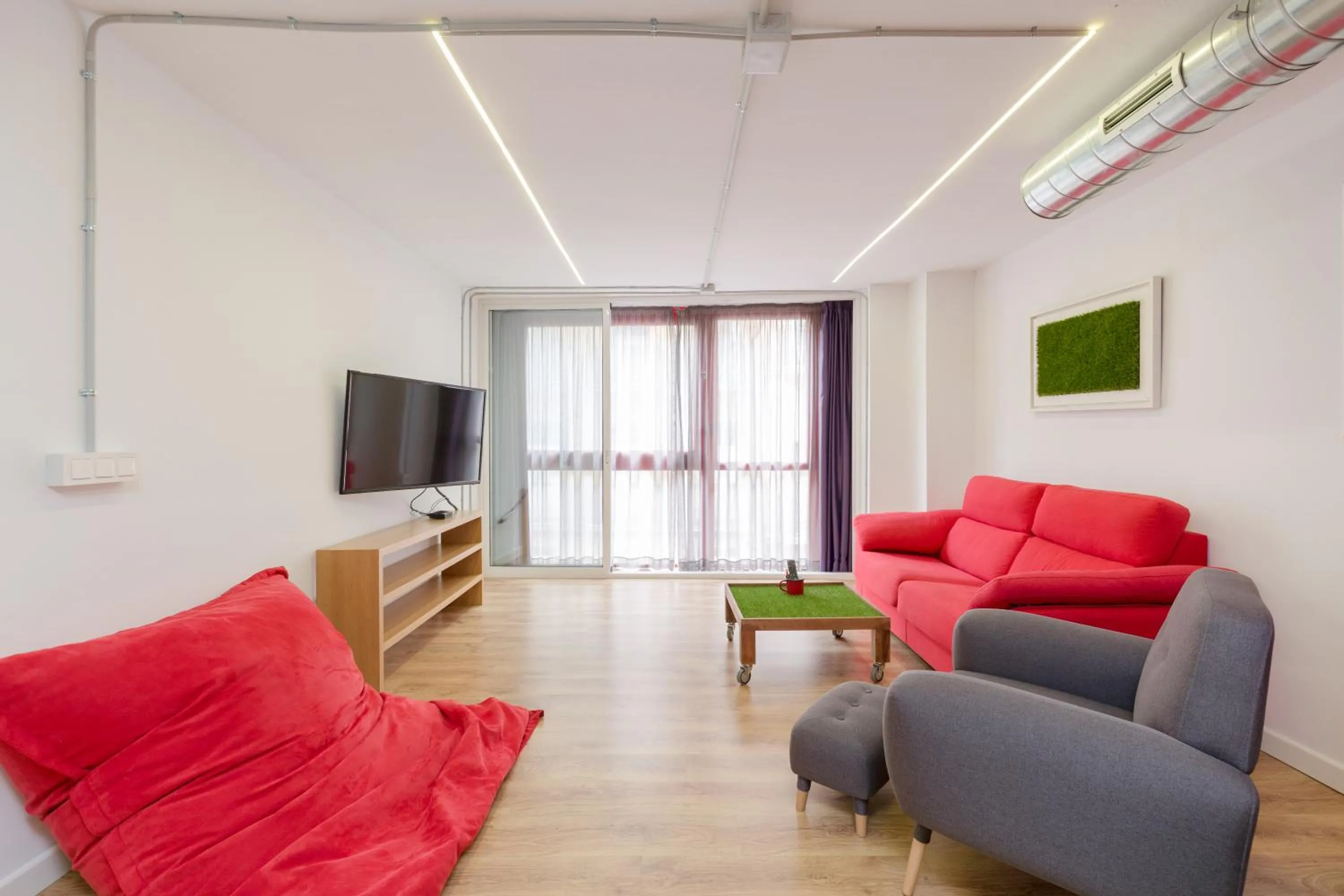 Living room in Tomate Rooms