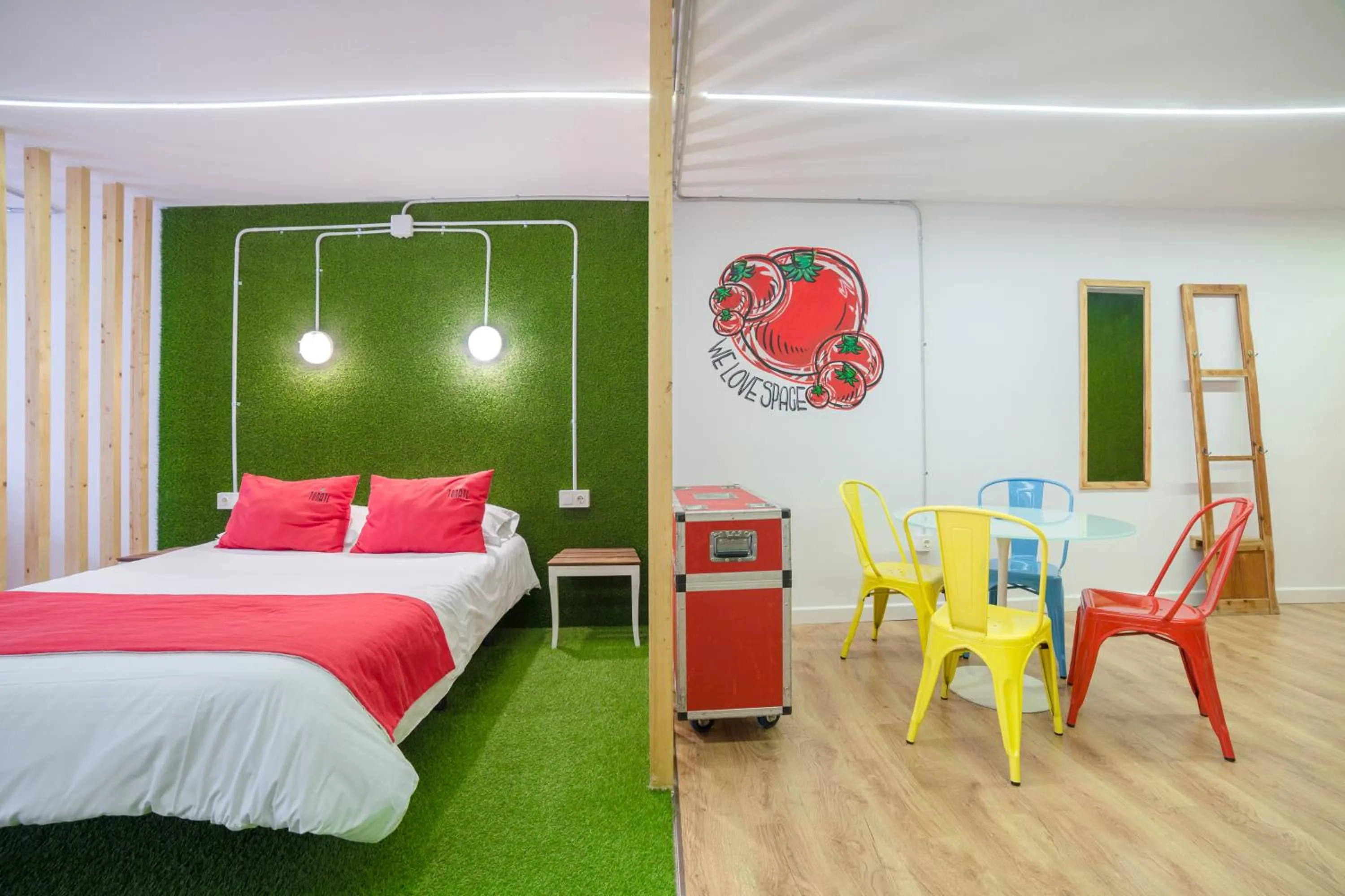 Bed in Tomate Rooms