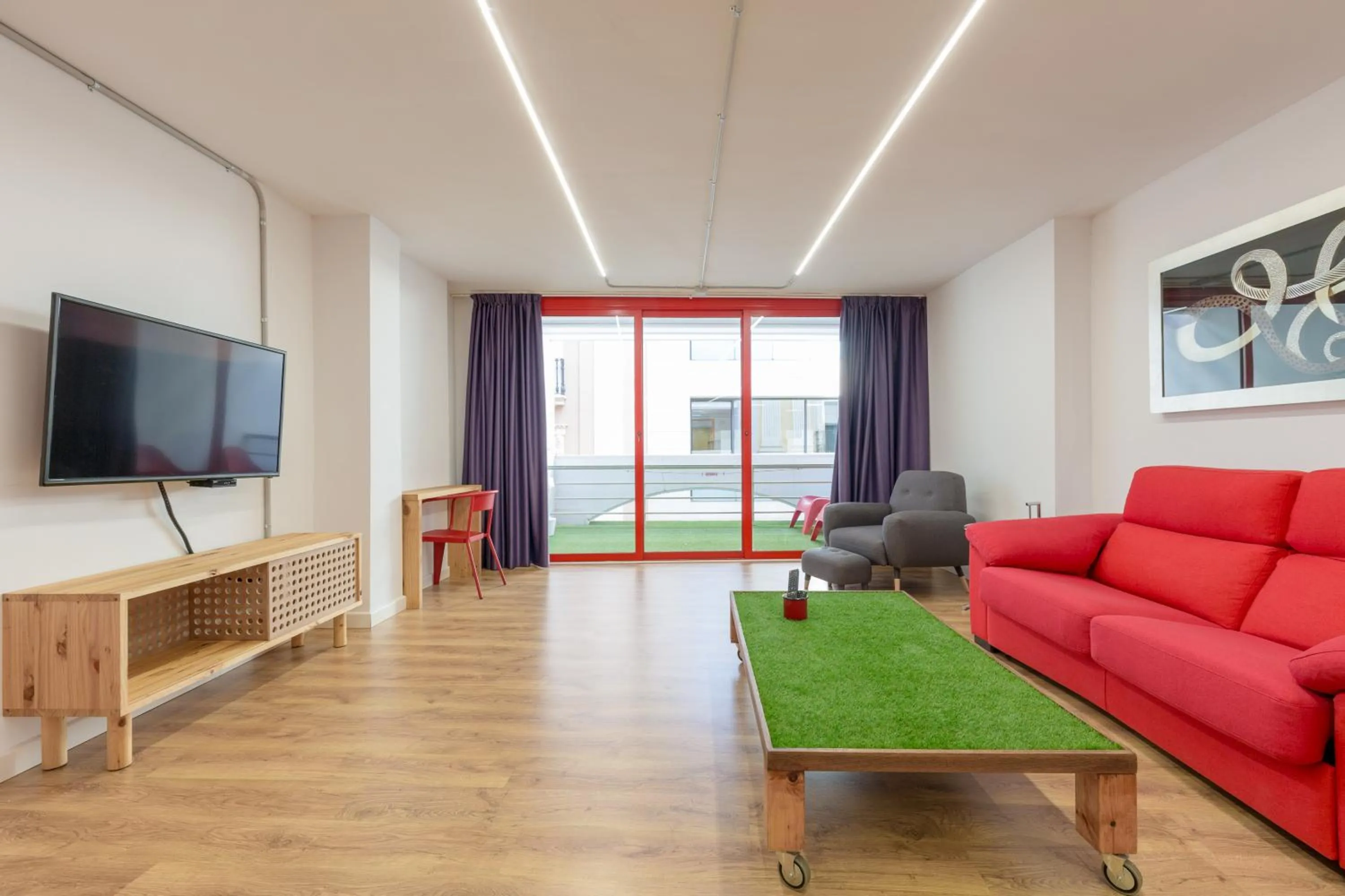 Living room in Tomate Rooms
