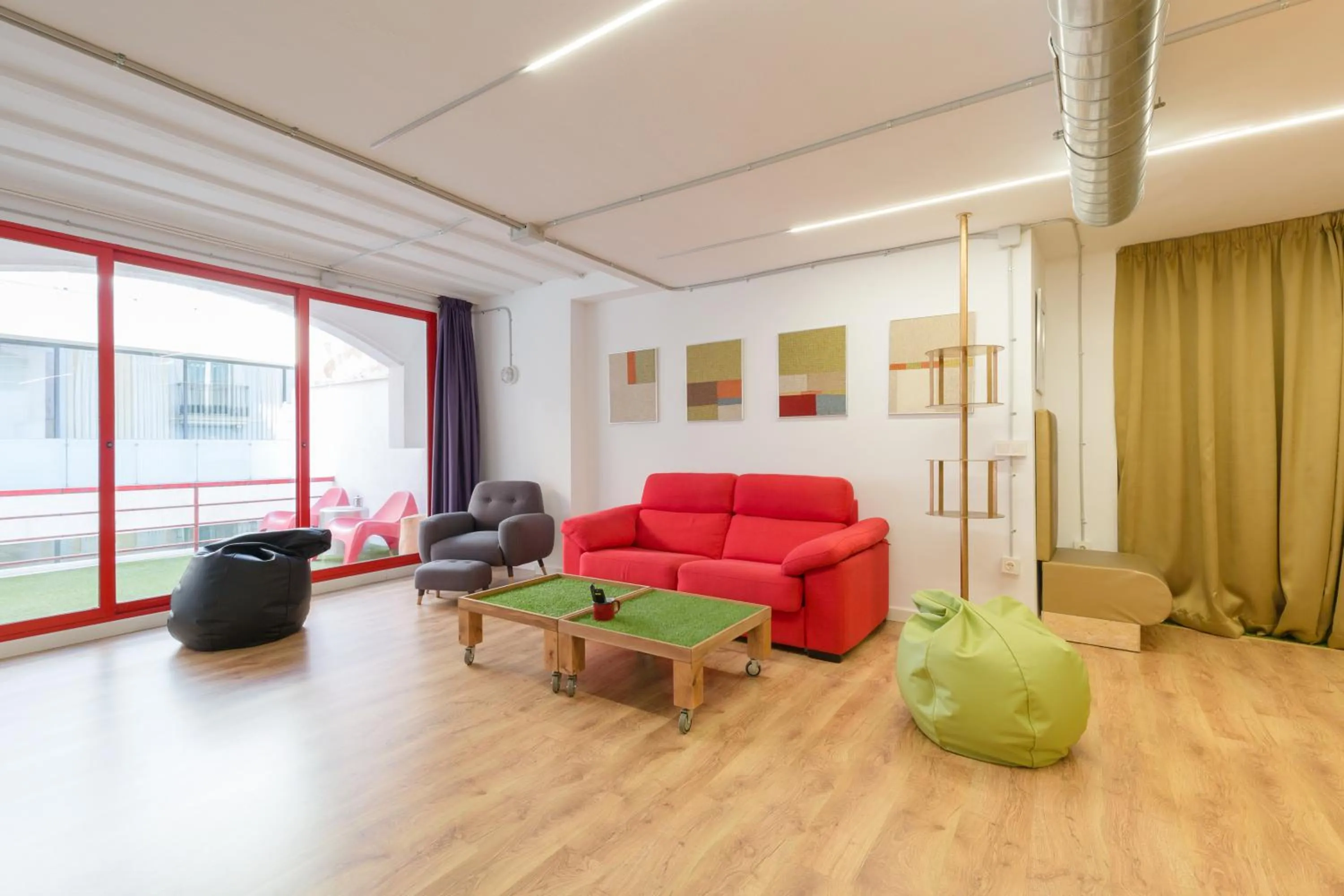 Living room in Tomate Rooms