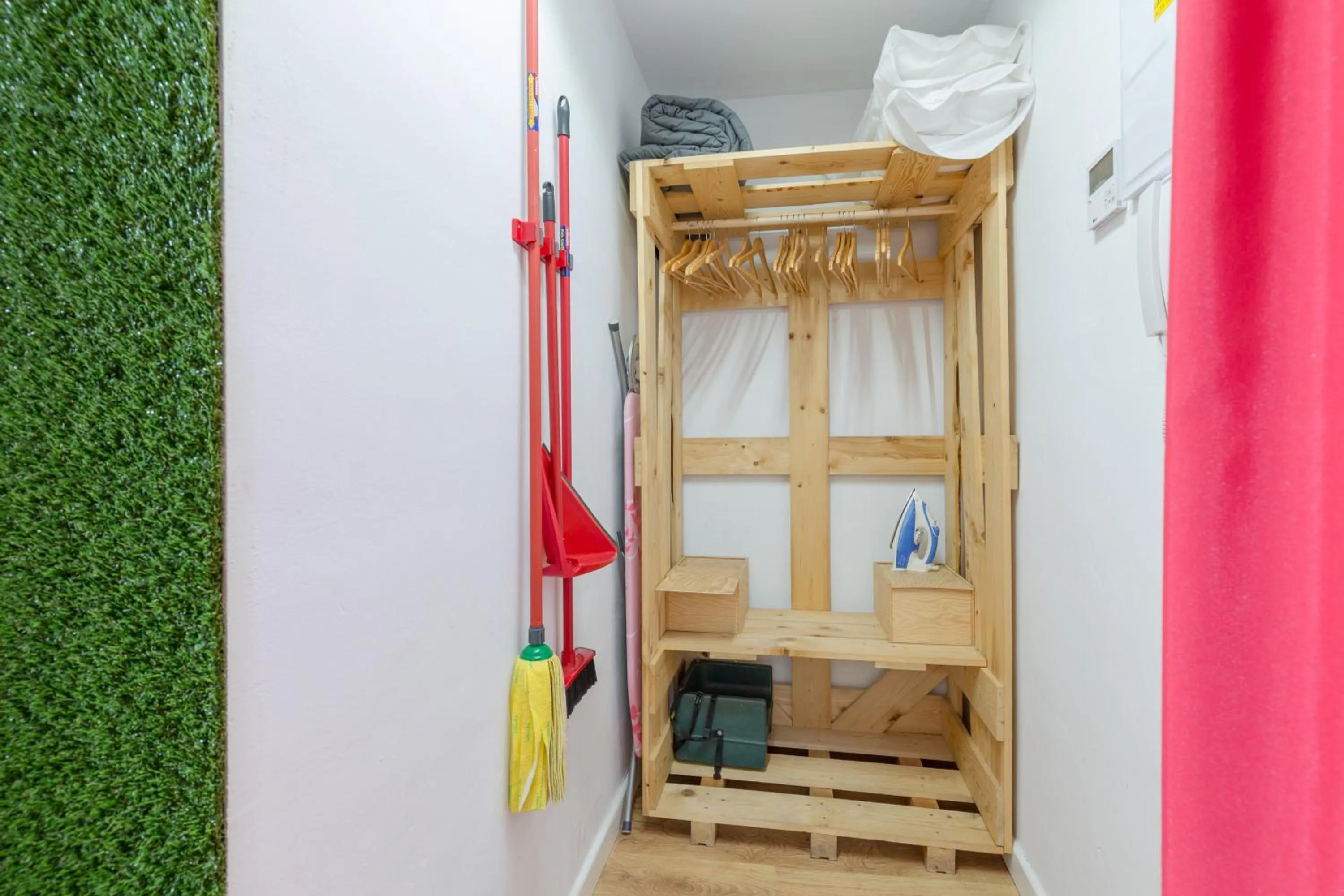 Bed in Tomate Rooms