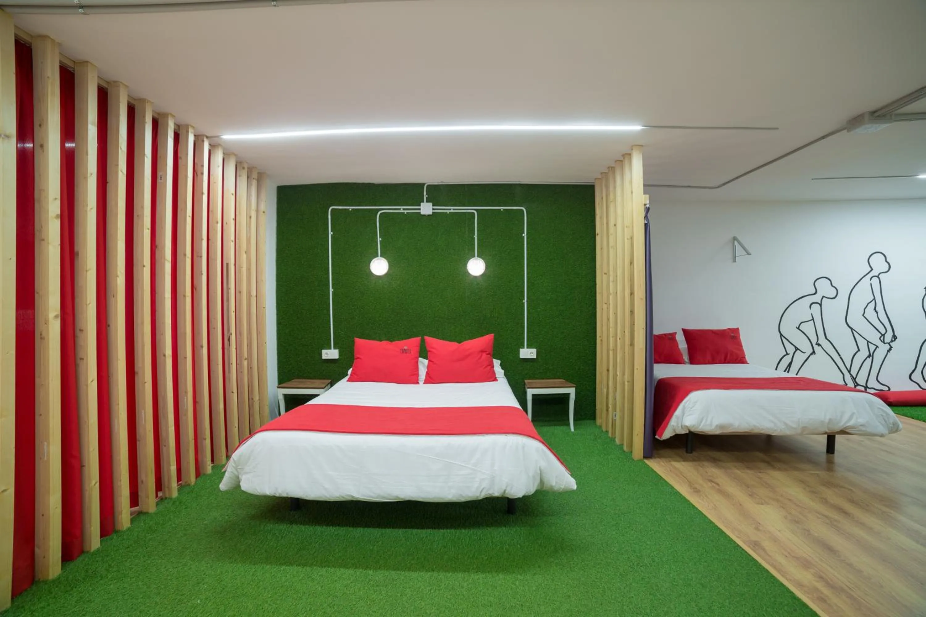 Bed in Tomate Rooms
