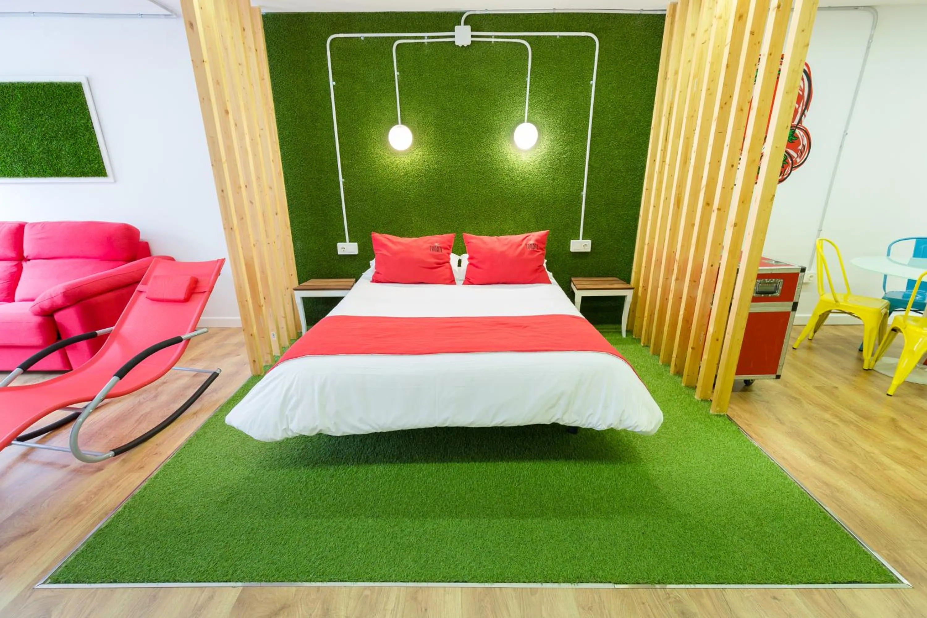Bed in Tomate Rooms