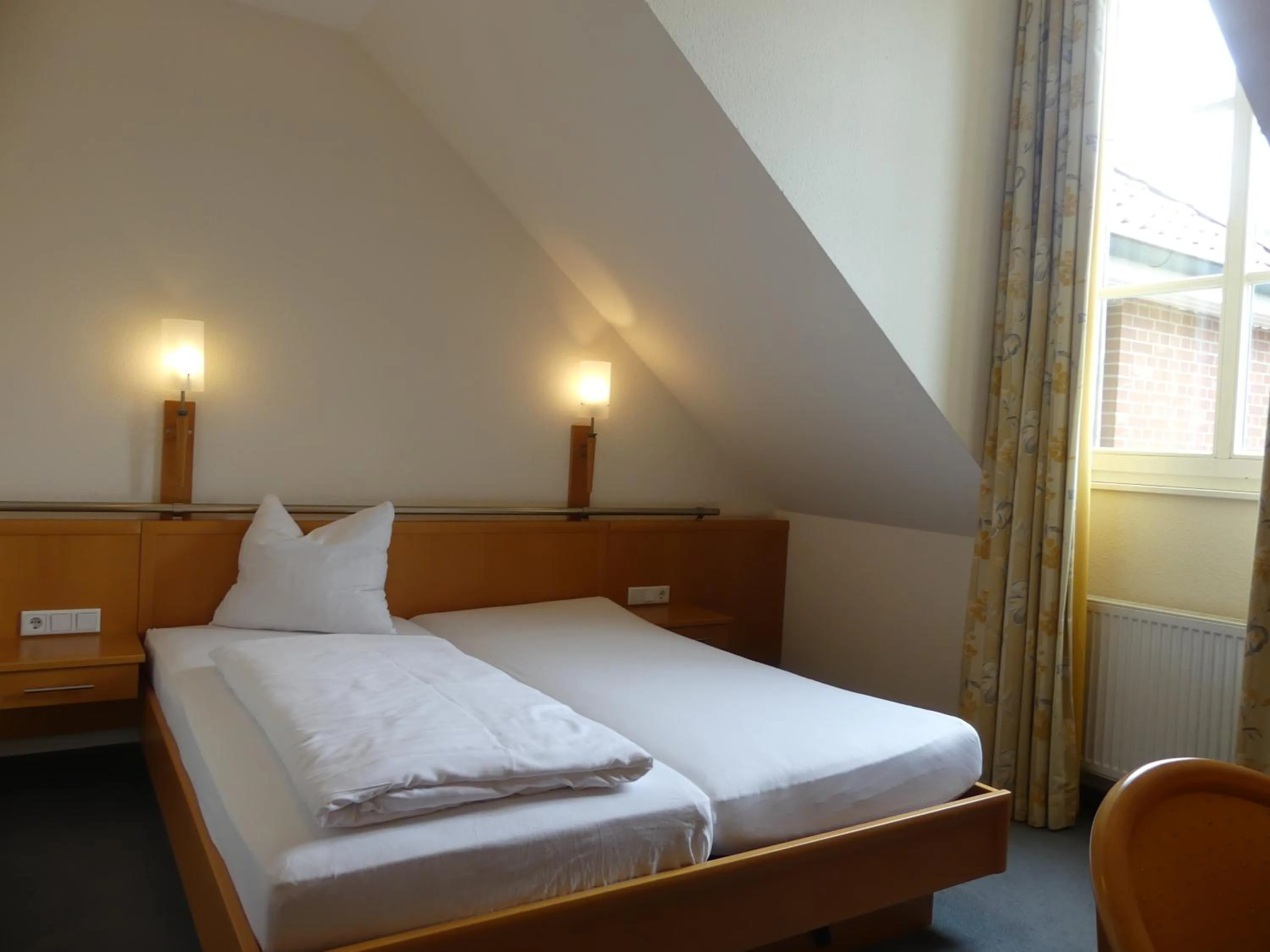Photo of the whole room, Bed in Landgasthaus Hotel Eggert