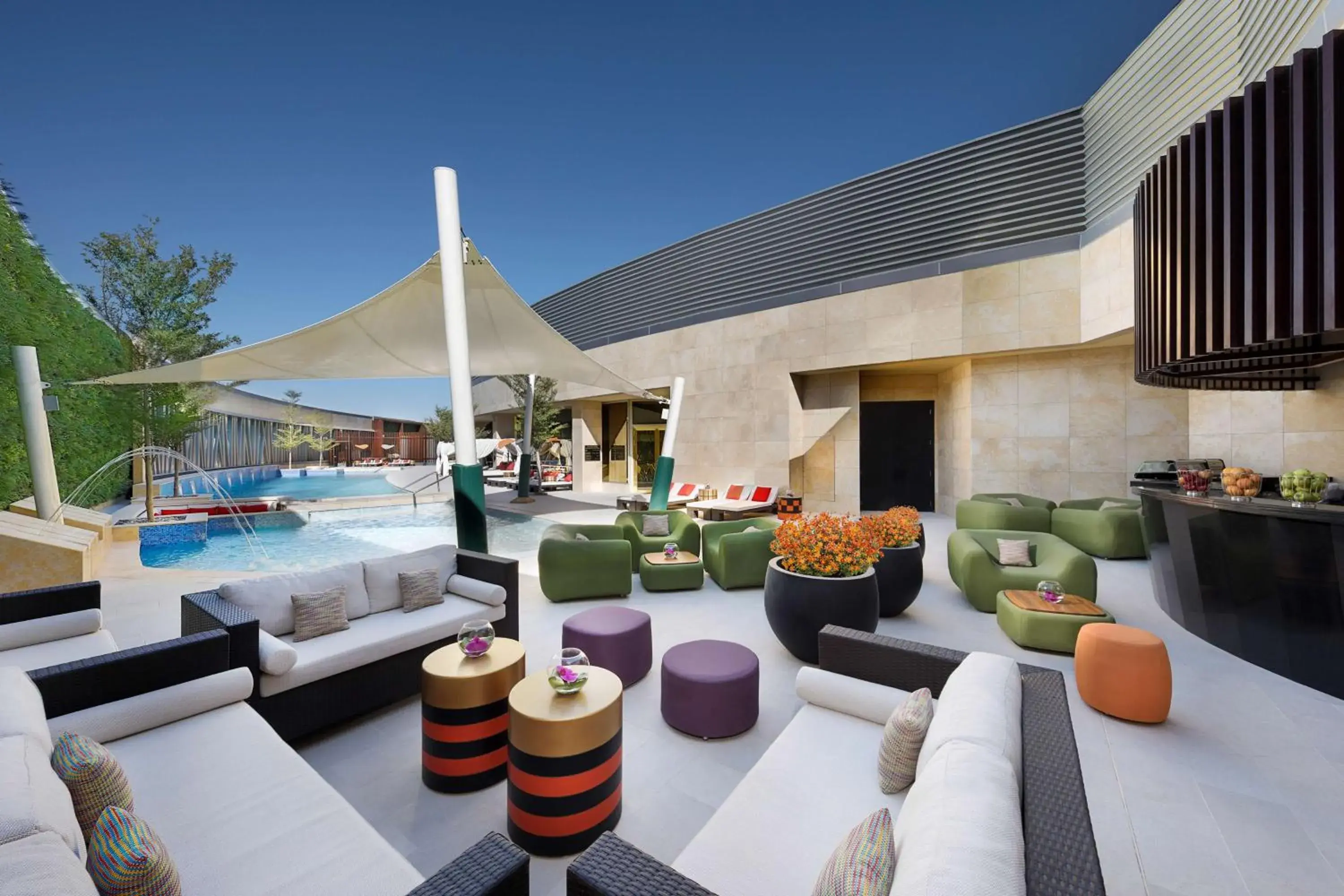 Pool view in AlRayyan Hotel Doha, Curio Collection by Hilton Pool view in AlRayyan Hotel Doha, Curio Collection by Hilton