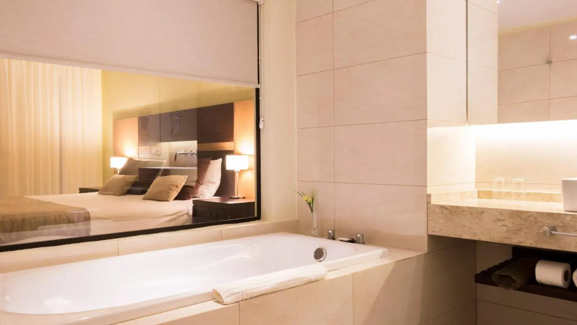 Bathroom, Bed in Pirayu Hotel & Resort Bathroom, Bed in Pirayu Hotel & Resort