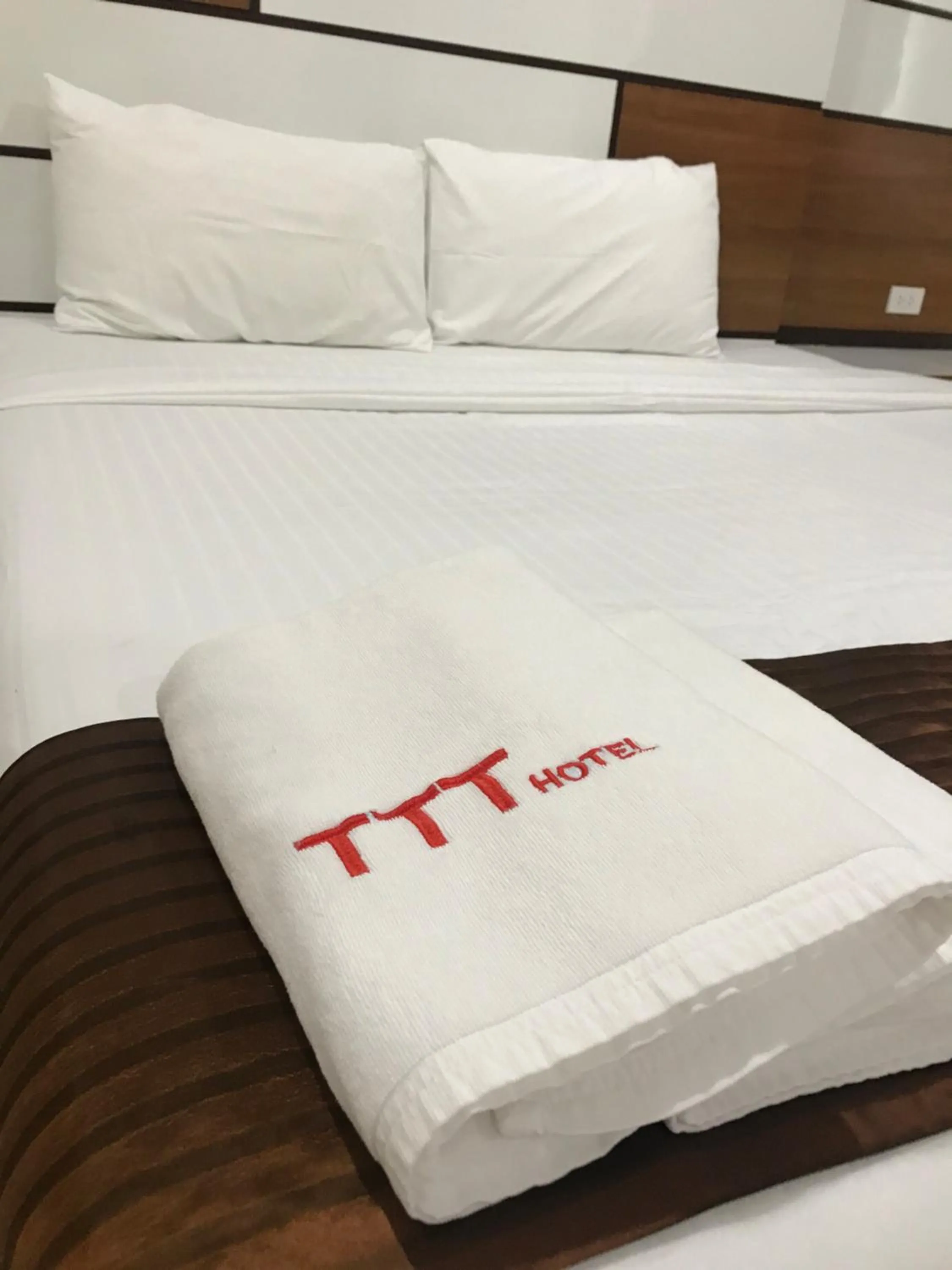Bed in TTT Hotel