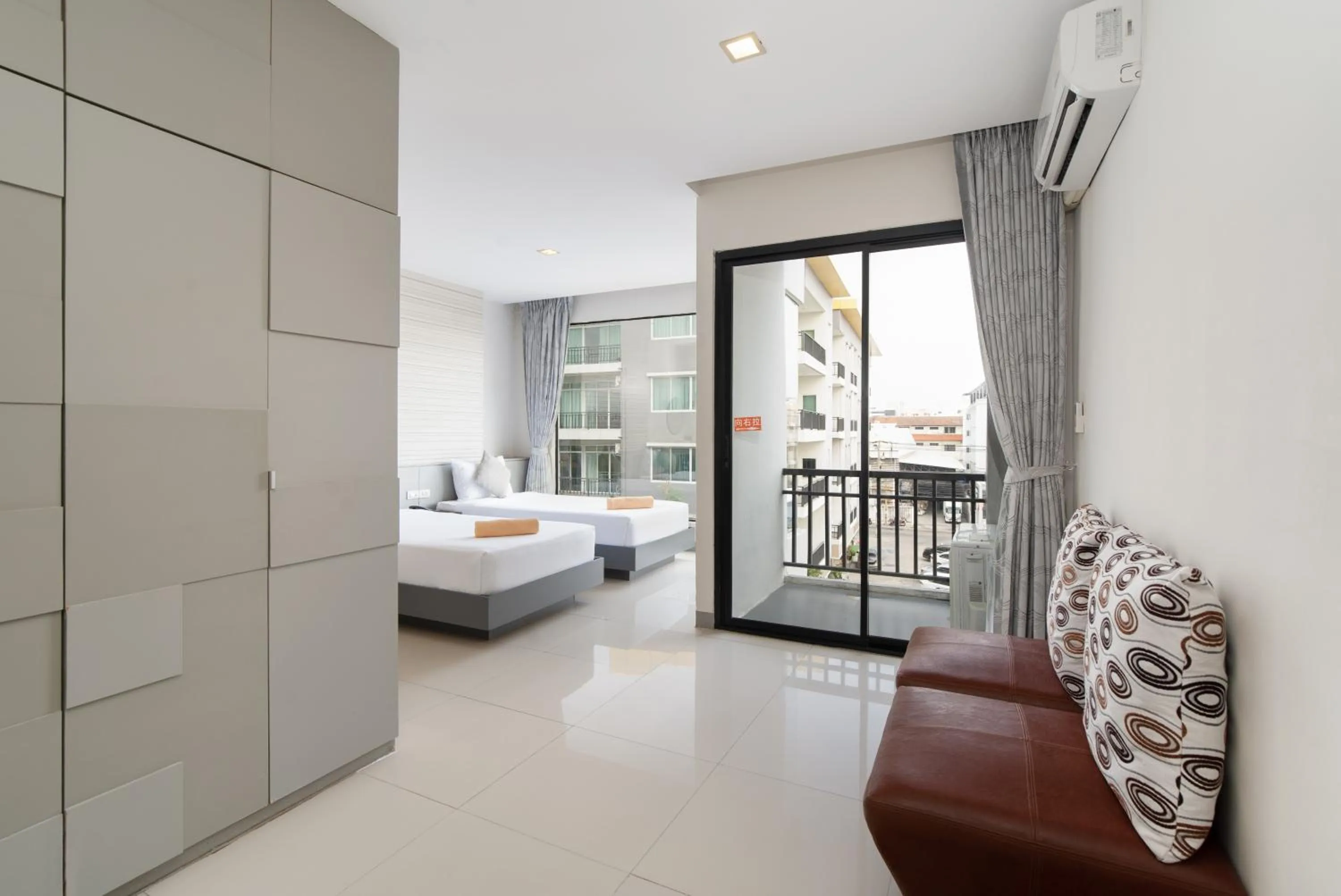 Bed in Leenova Hotel