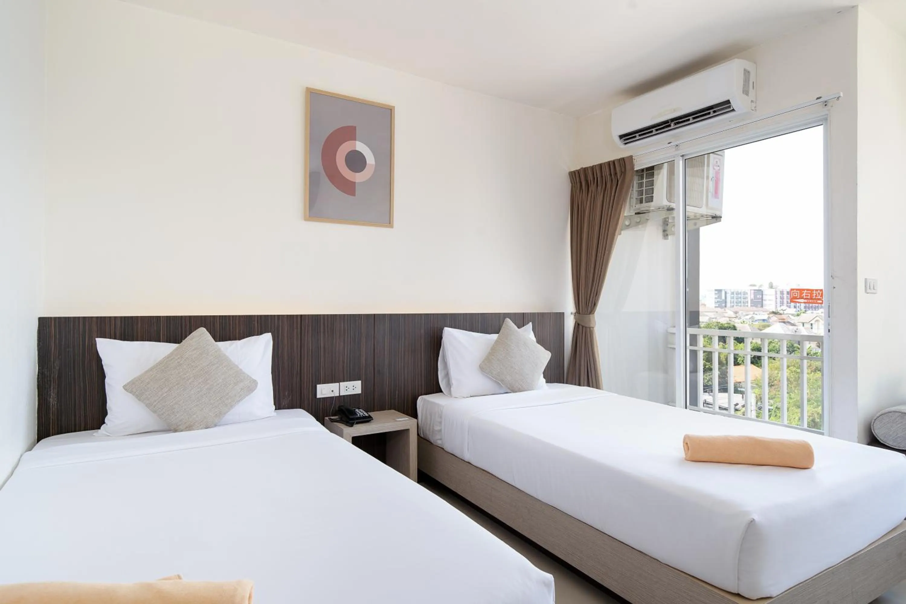 Bed in Leenova Hotel