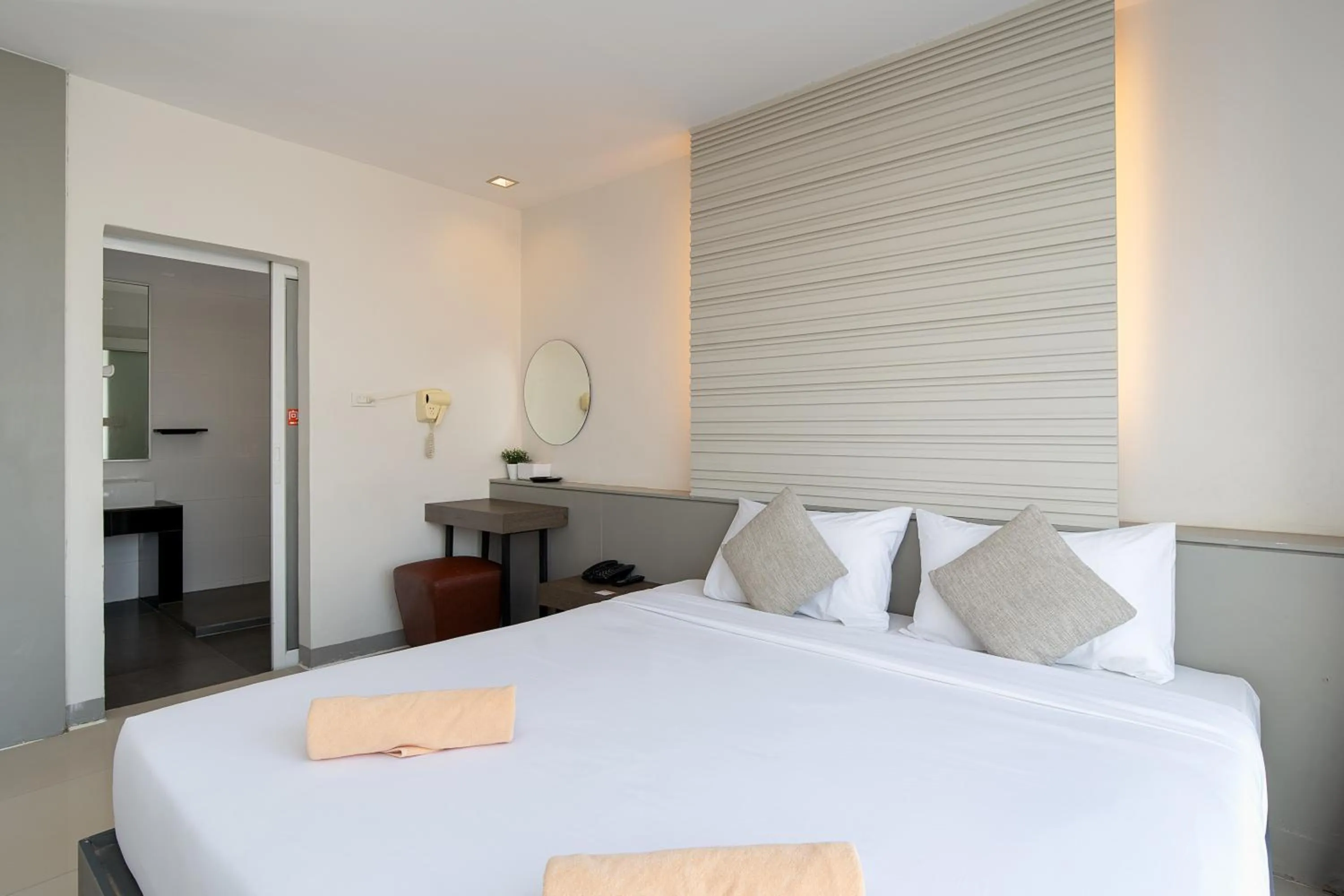 Bed in Leenova Hotel