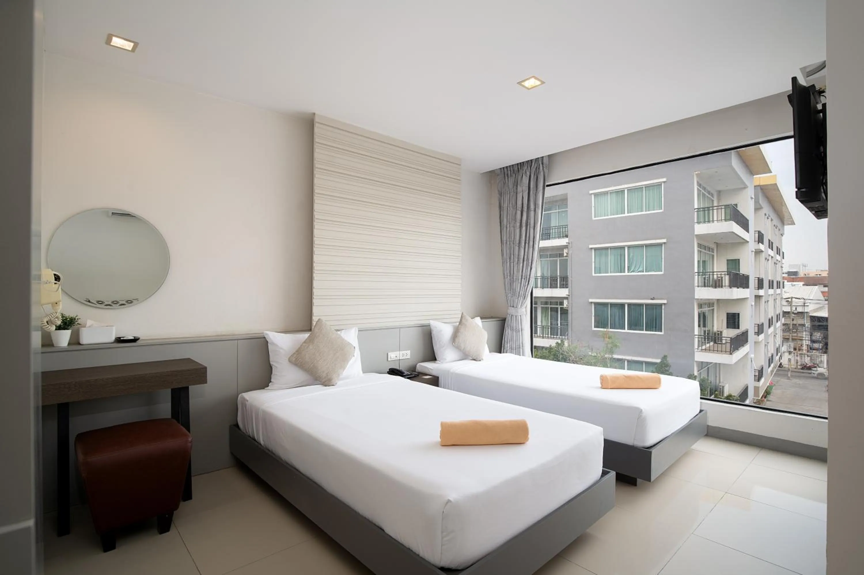 Bed in Leenova Hotel