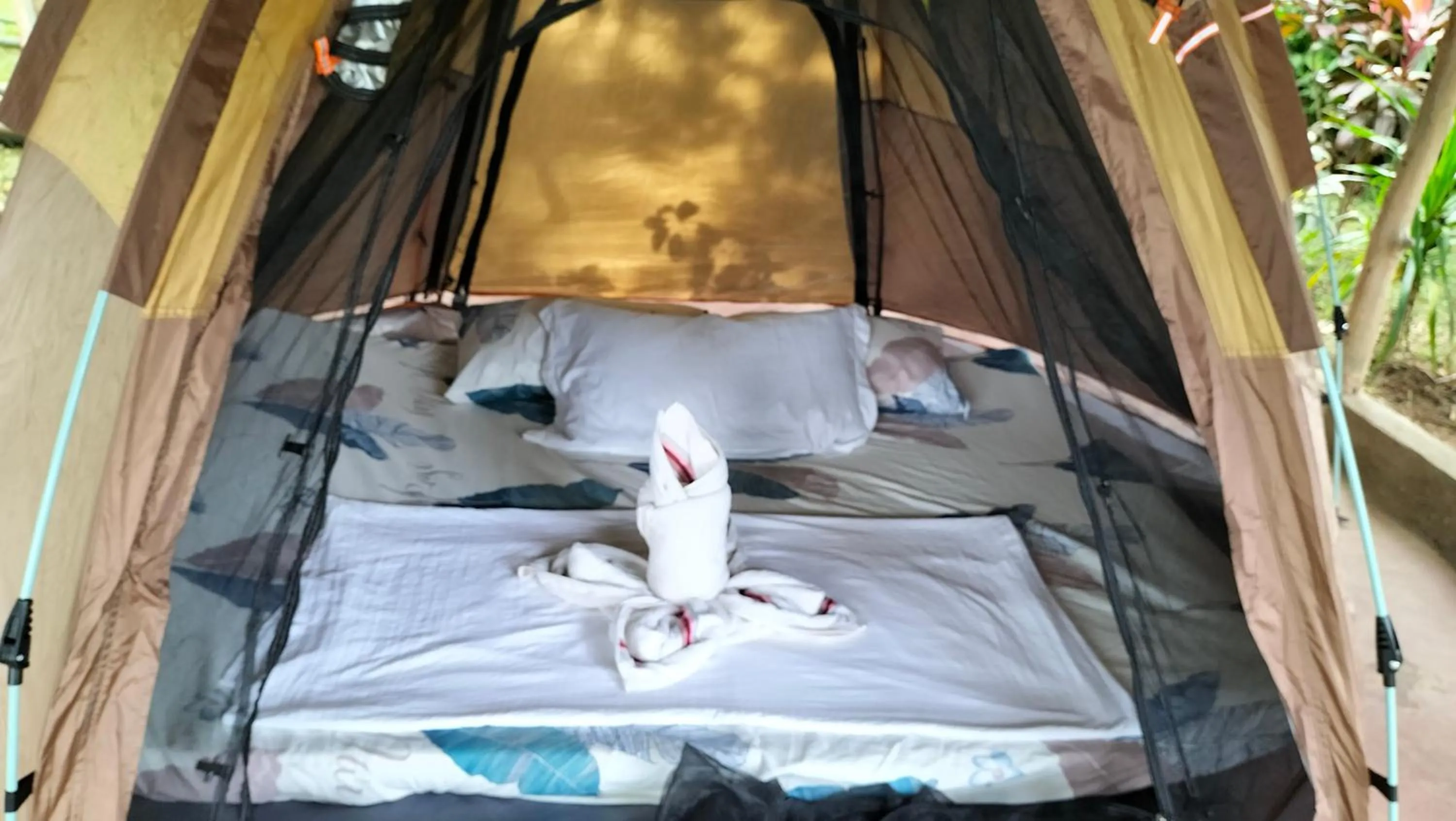 Bed in Erlittop Nature Lodge