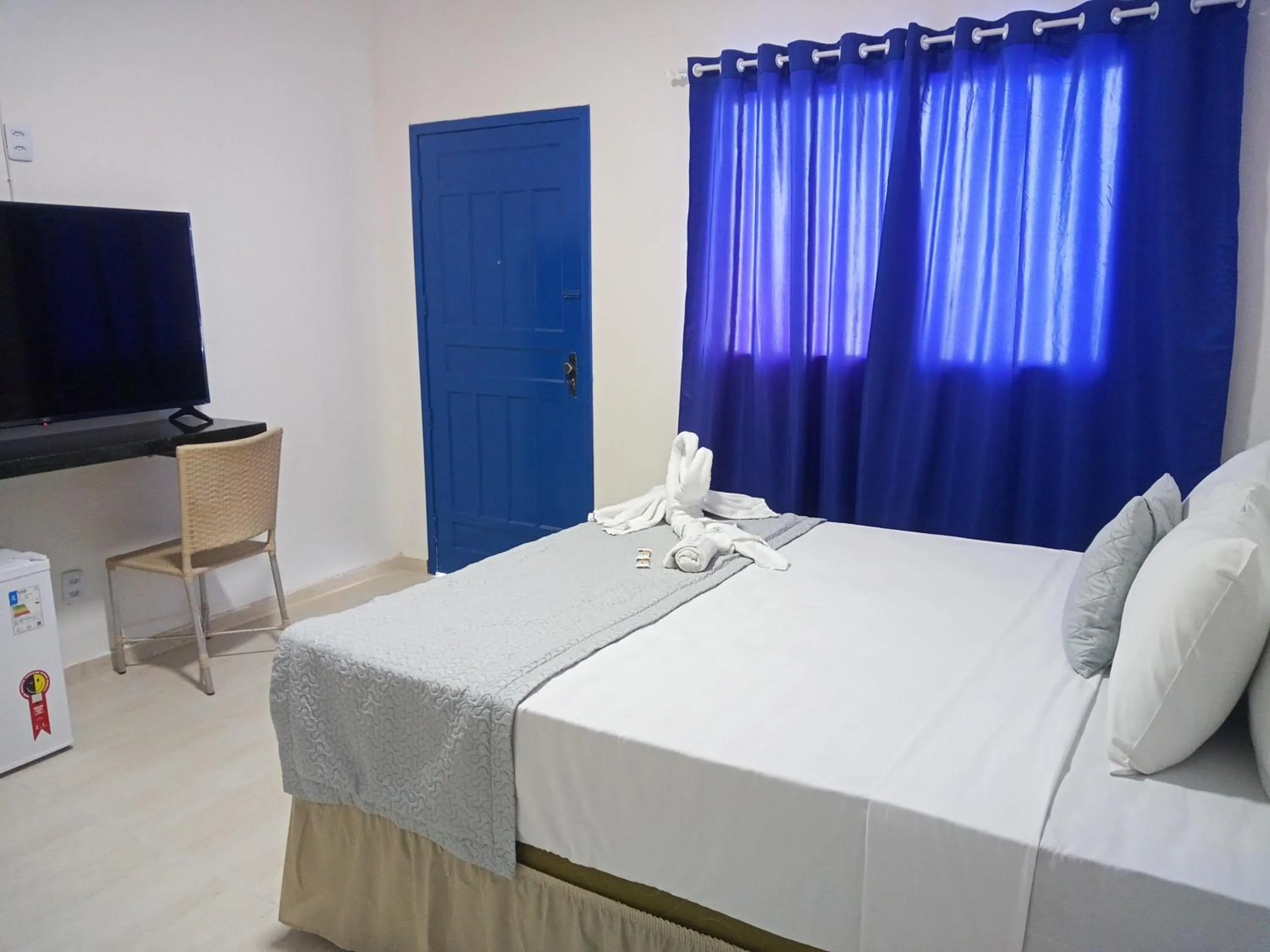 Photo of the whole room, Bed in La Suite Praia Hotel