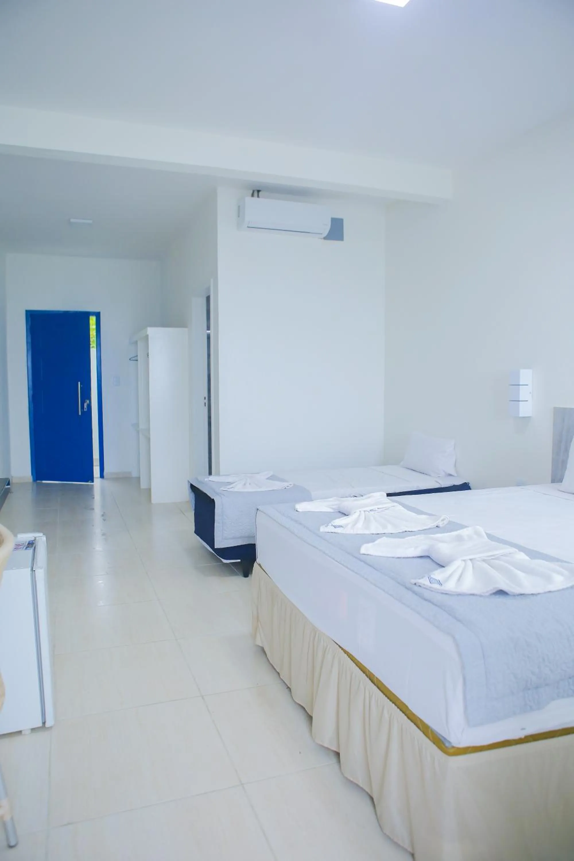 Photo of the whole room, Bed in La Suite Praia Hotel