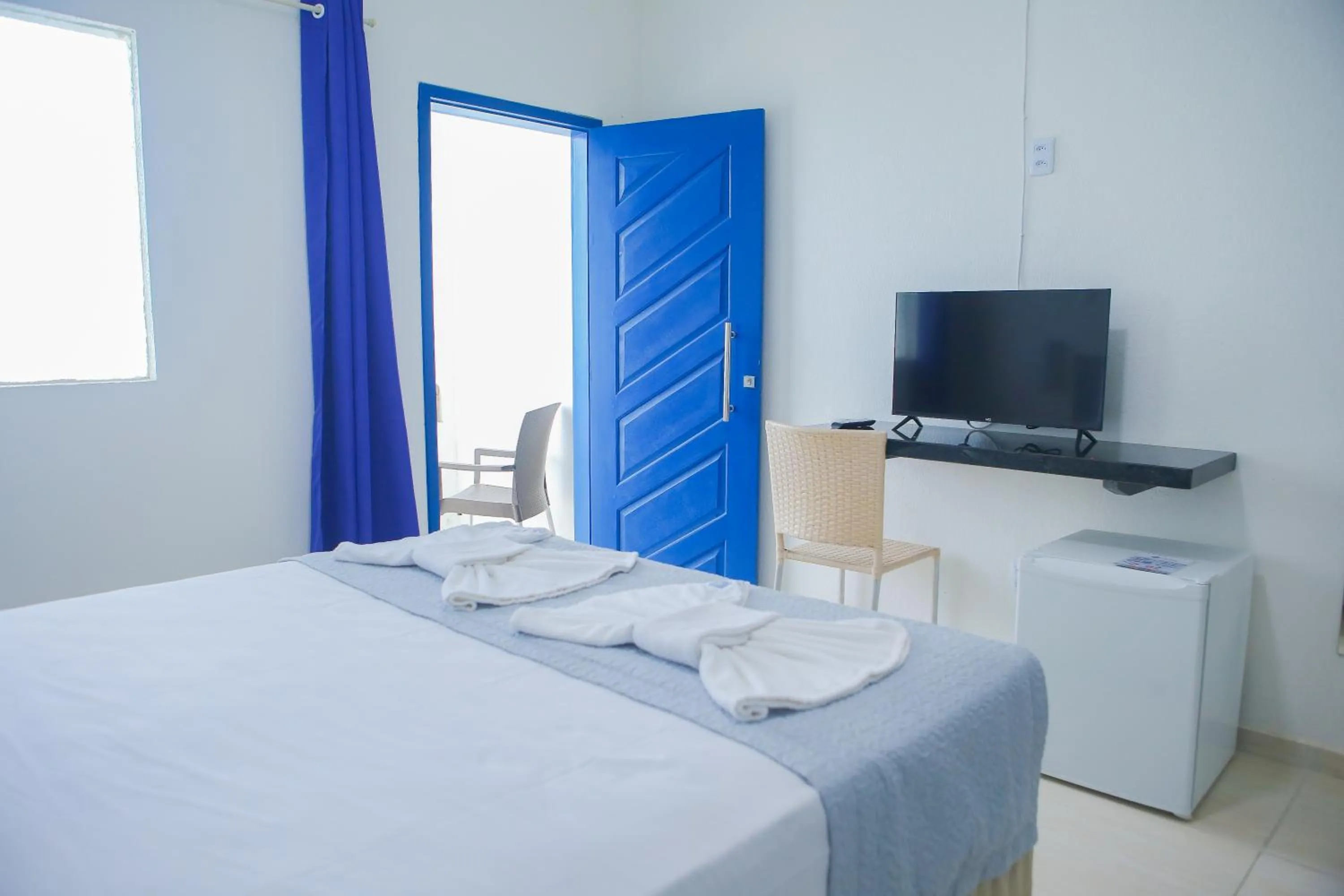 Photo of the whole room, Bed in La Suite Praia Hotel