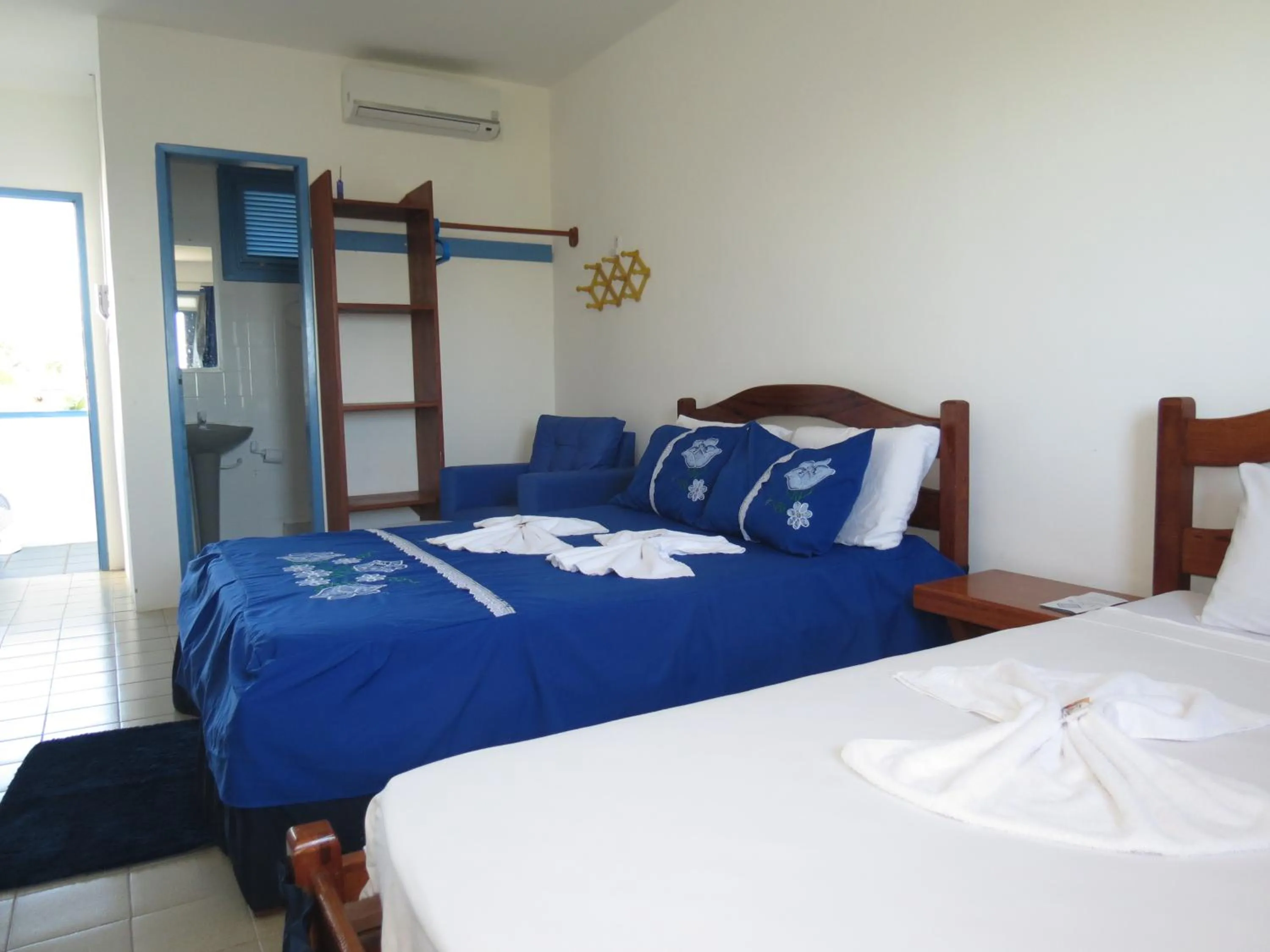 Bed in La Suite Praia Hotel