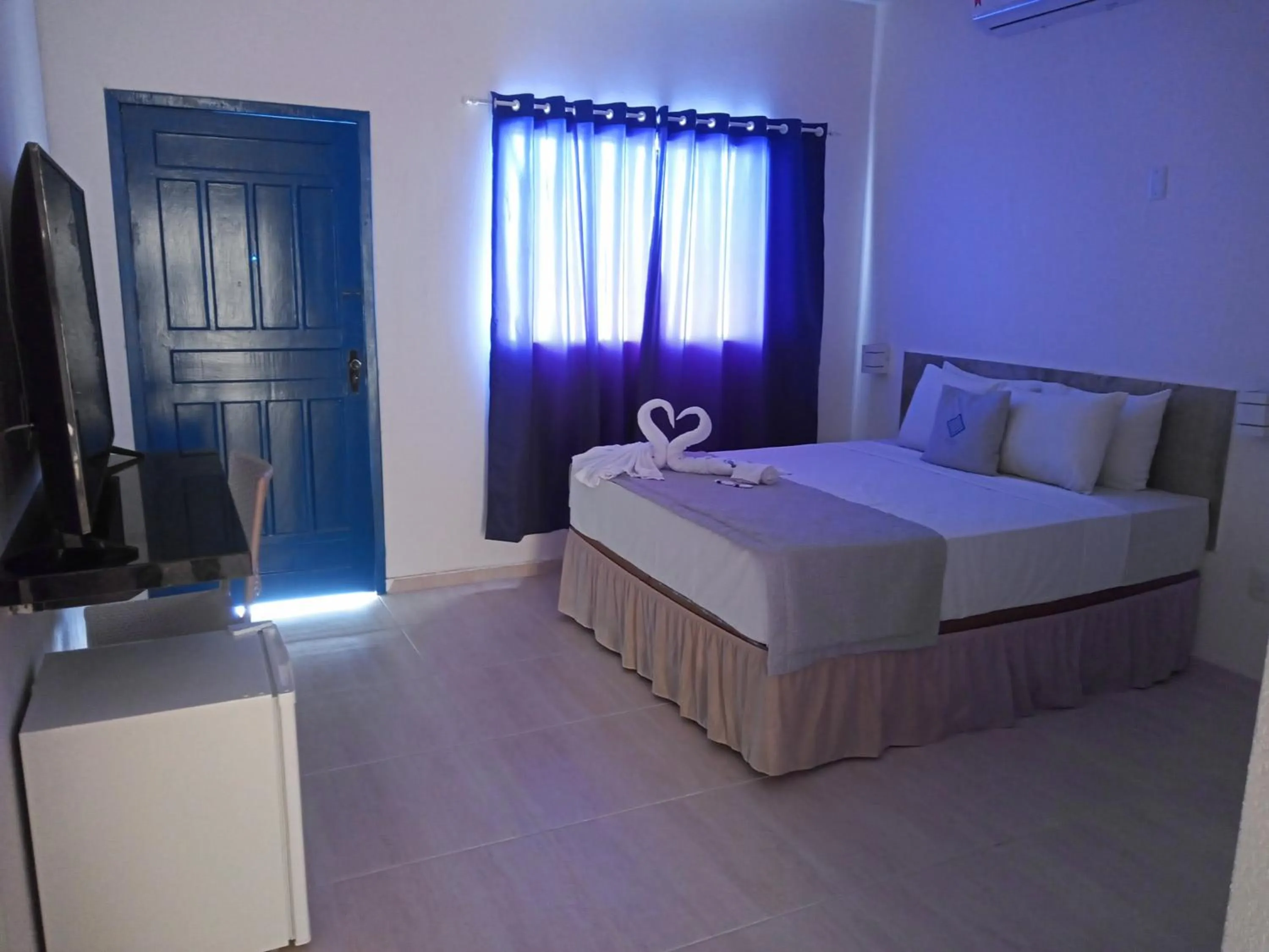 Photo of the whole room, Bed in La Suite Praia Hotel